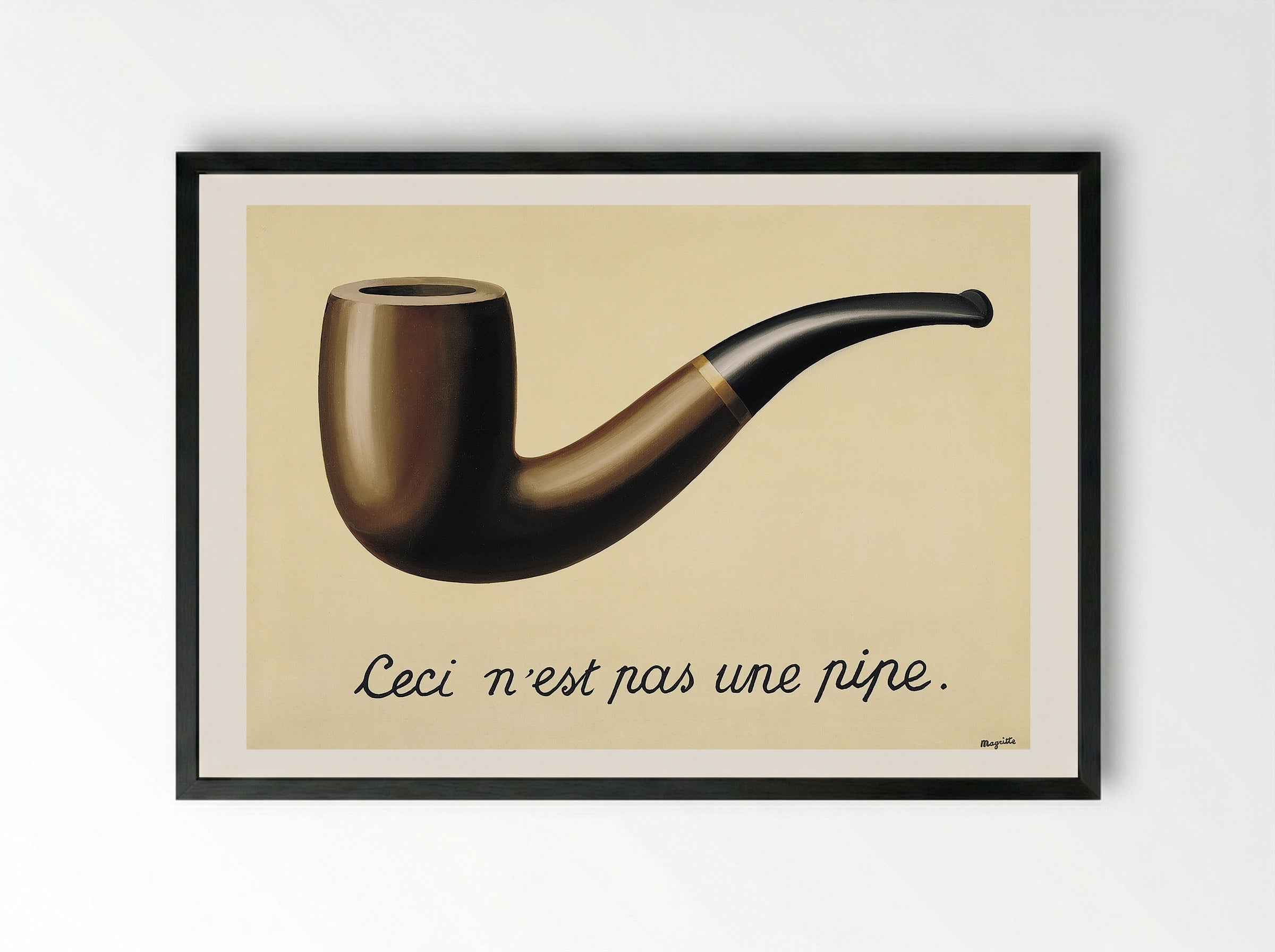 The Treachery of Images (This is Not a Pipe) - René Magritte - Framed Print Black