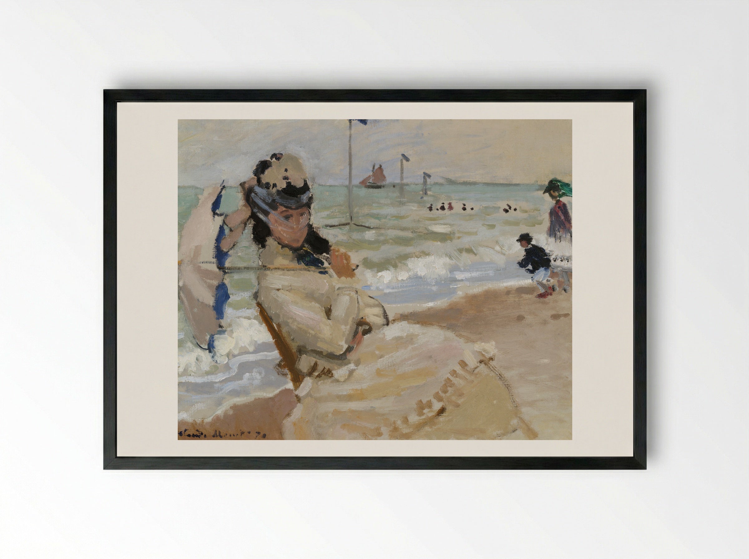 Camille on the Beach in Trouville - Claude Monet - Framed Print Black