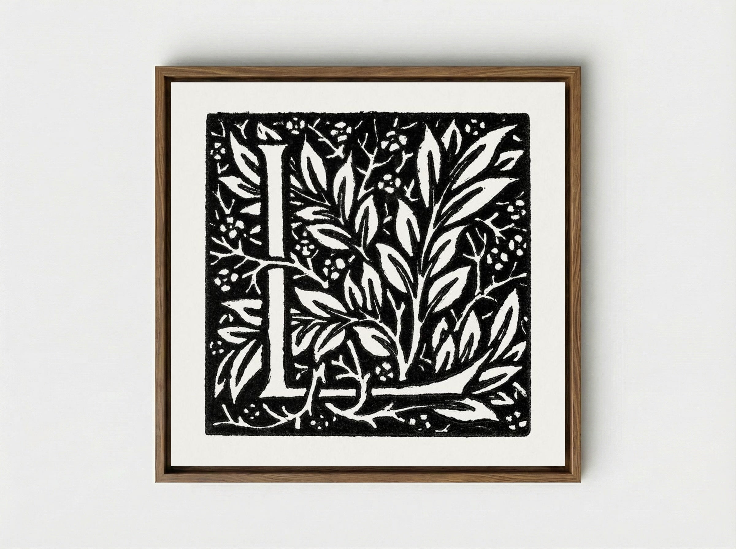 Love is Enough: Initial Letter 'L' entwined with Laurel Leaves - William Morris - Framed Canvas Wood