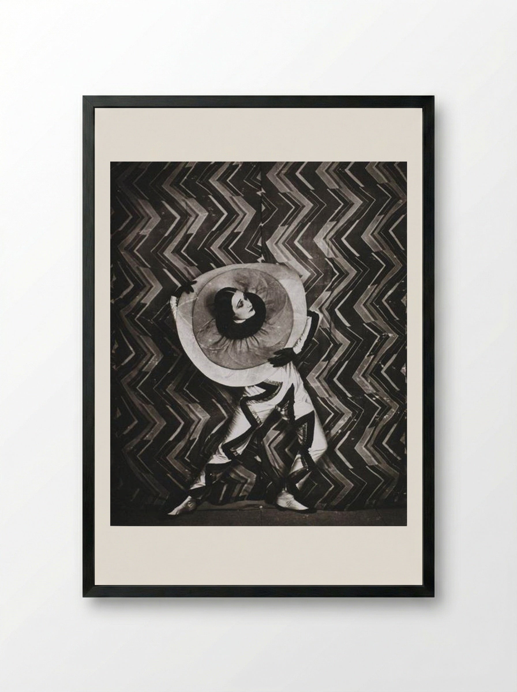 Wearing the Pierrot-Éclair costume designed by Sonia Delaunay, on the set of René Le Somptier’s film Le P’tit Parigot - Sonia Delaunay - Framed Print Black