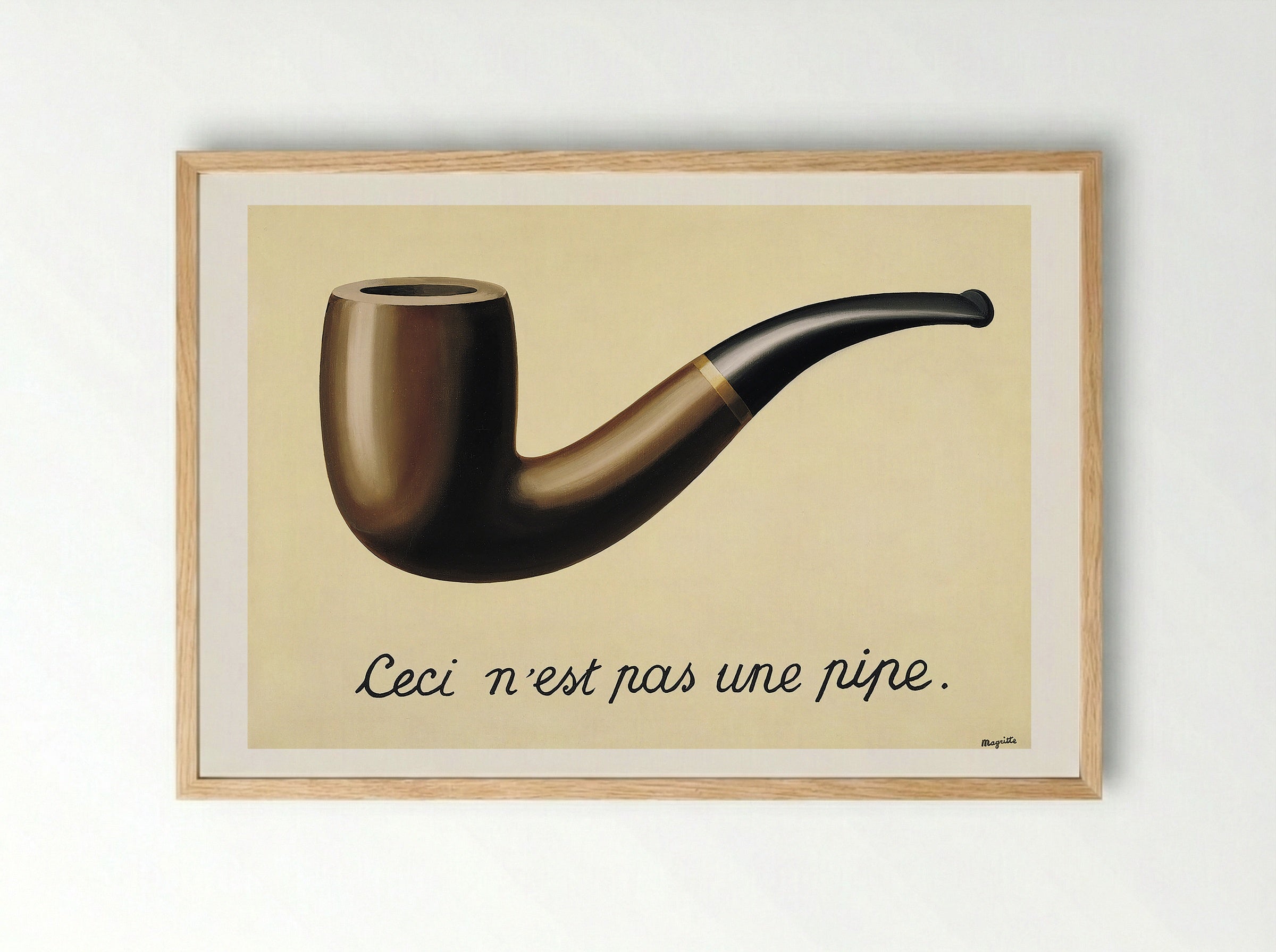 The Treachery of Images (This is Not a Pipe) - René Magritte - Framed Print Wood