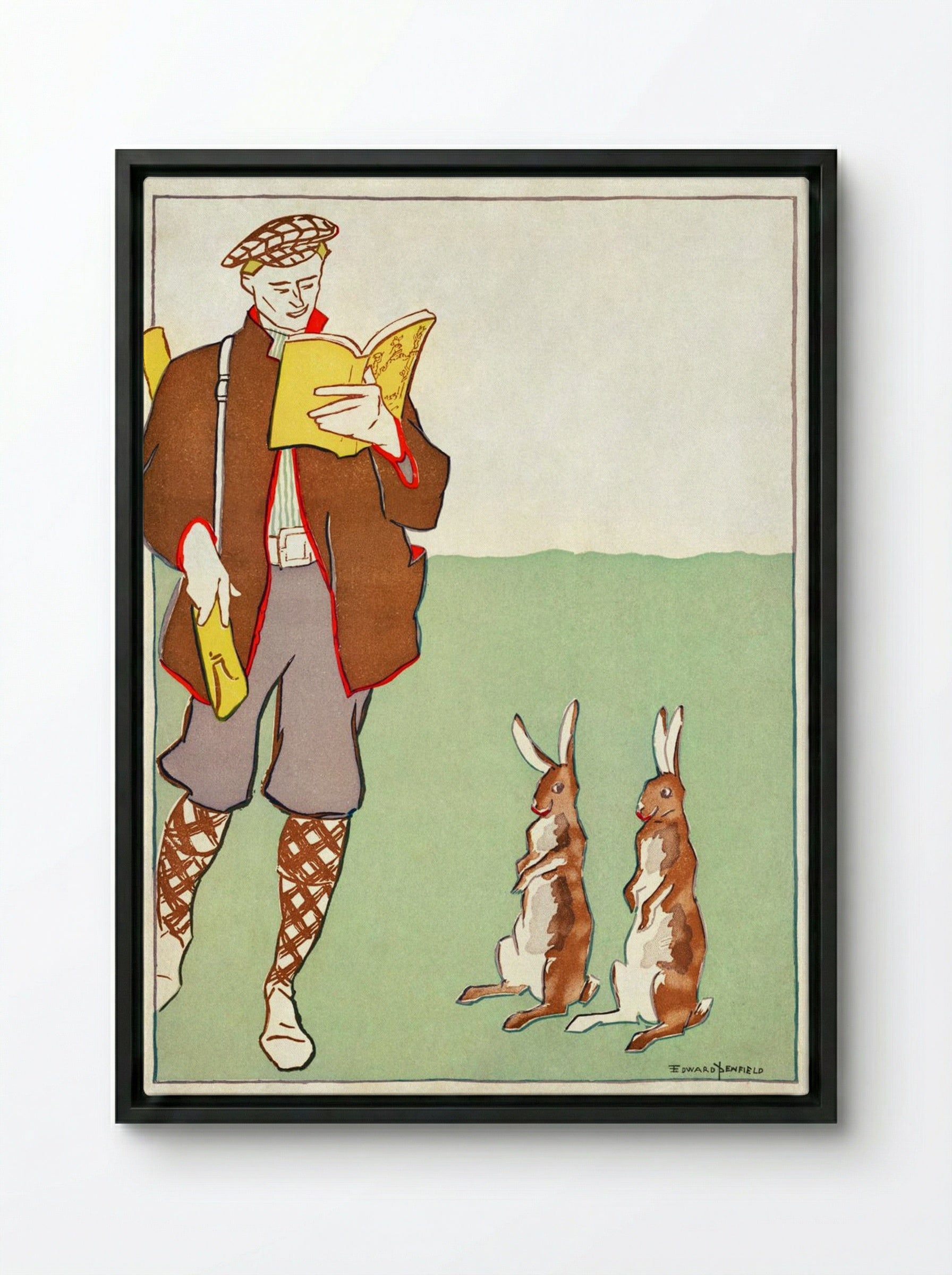 Man Reading a Book with Hares - Edward Penfield - Framed Canvas Black