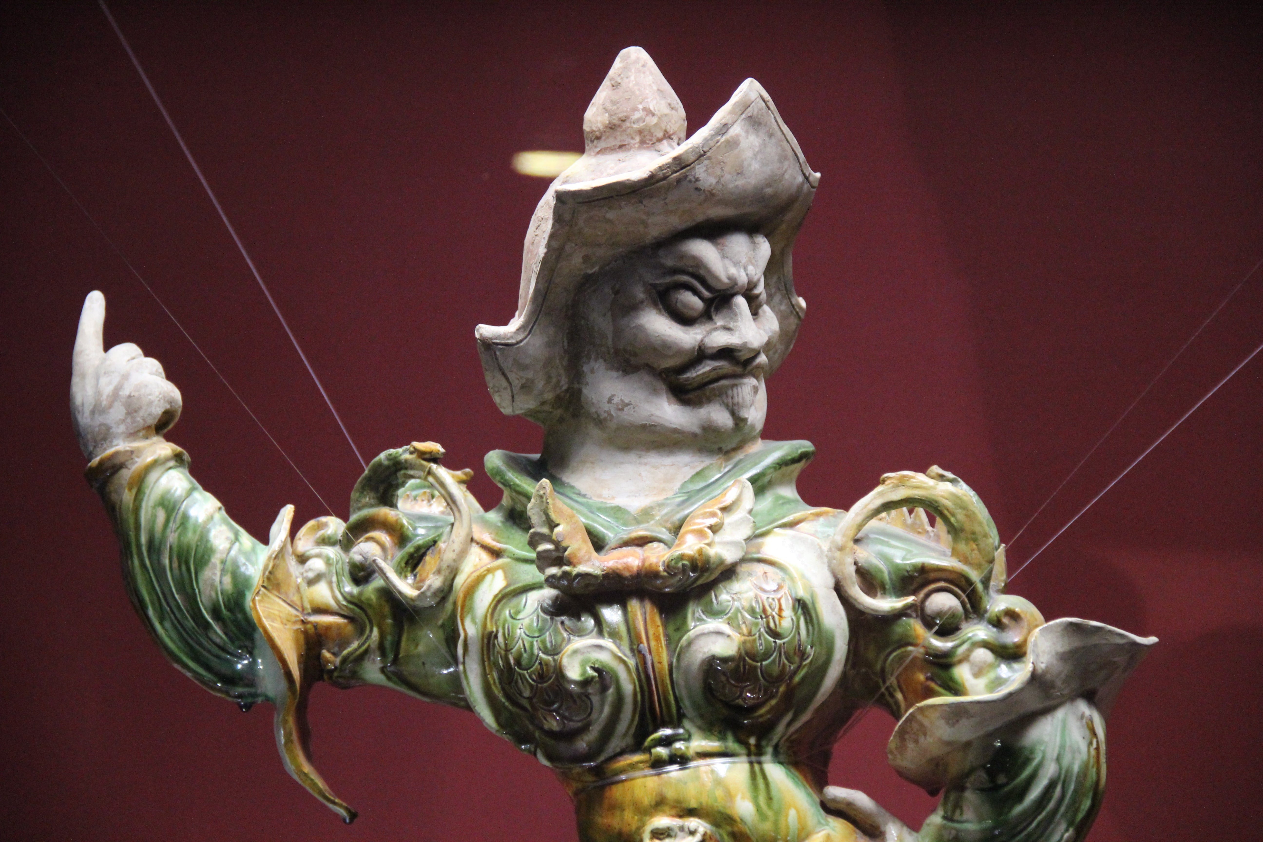 Tang dynasty sancai tri-colour glazed guardian figure
