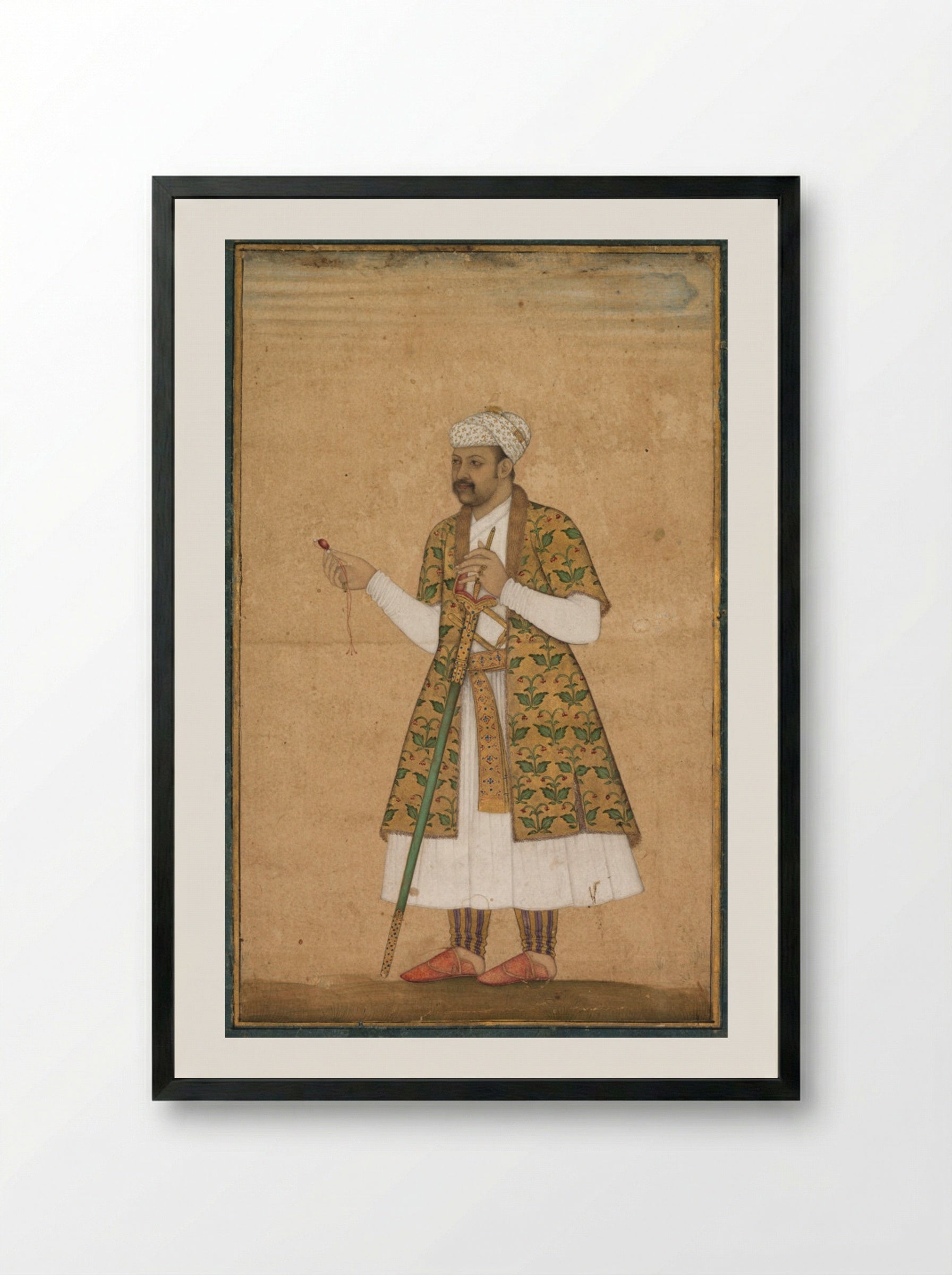 A Courtier, Possibly Khan Alam, Holding a Spinel and a Deccan Sword - Govardhan - Framed Print Black