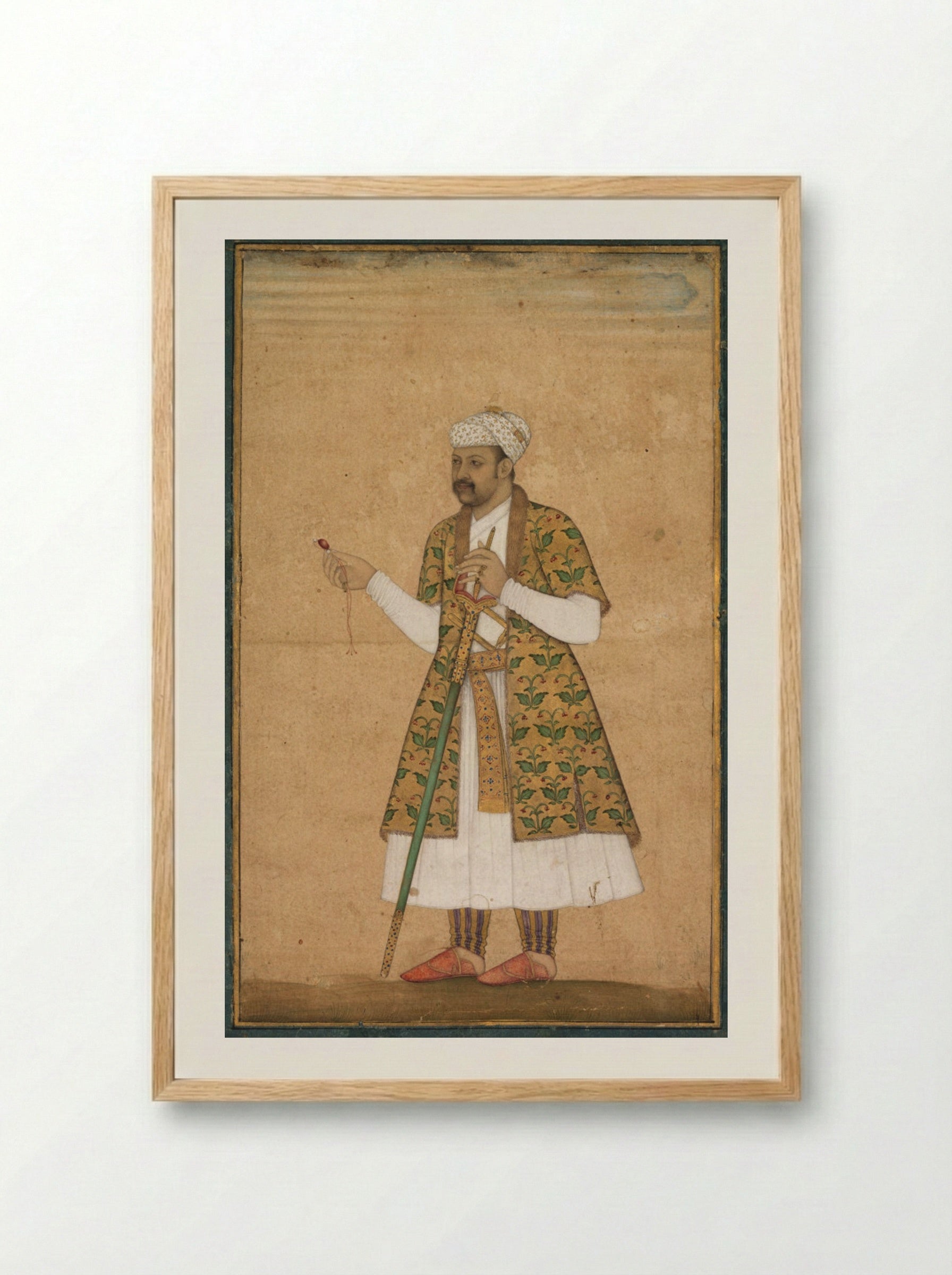 A Courtier, Possibly Khan Alam, Holding a Spinel and a Deccan Sword - Govardhan - Framed Print Wood