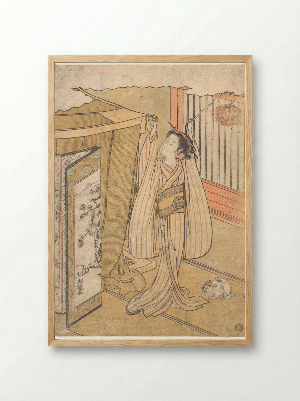 A Girl Hanging up a Mosquito Net Canopy over Her Bed - Isoda Koryūsai - Framed Print Wood