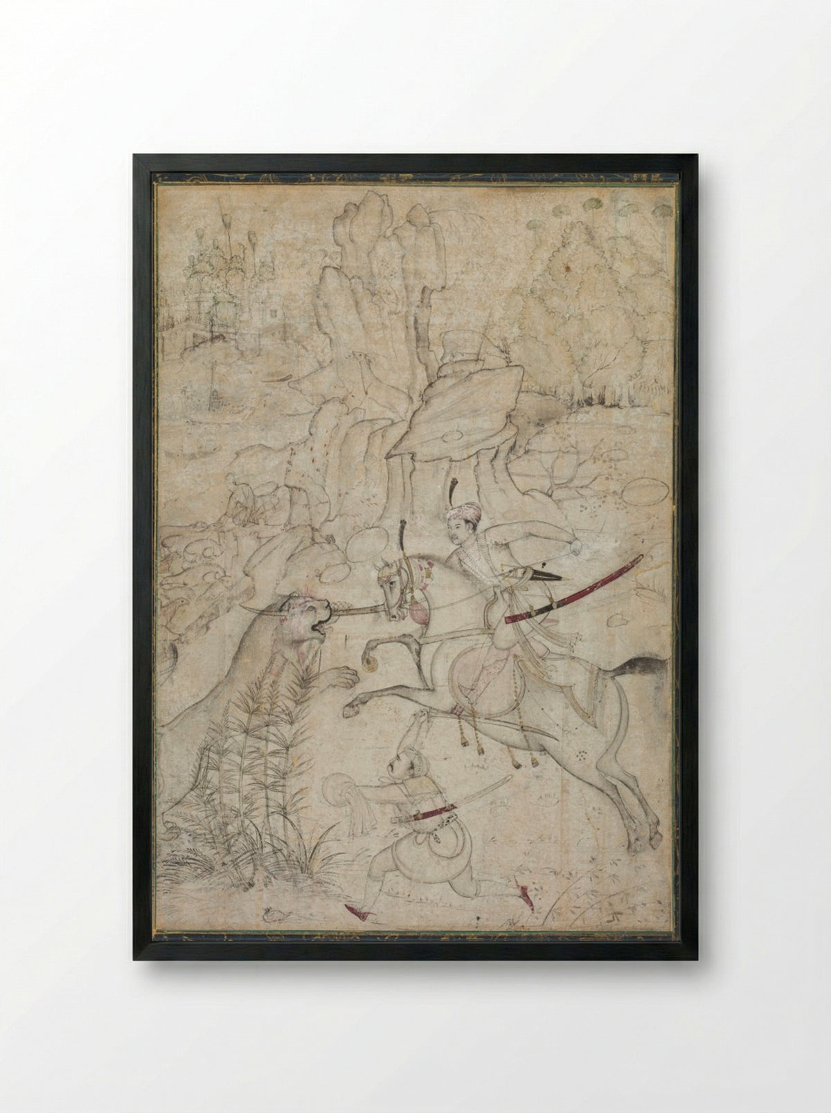 A Mounted Prince Hunting Lion in a Rocky Landscape - Khem Karan - Framed Print Black