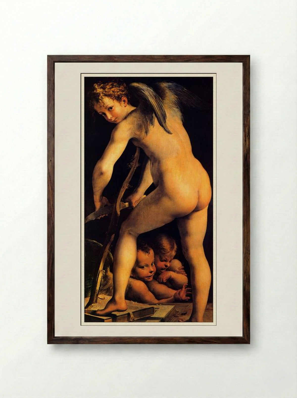 Amor Carving His Bow - Parmigianino - Framed Print Dark Wood