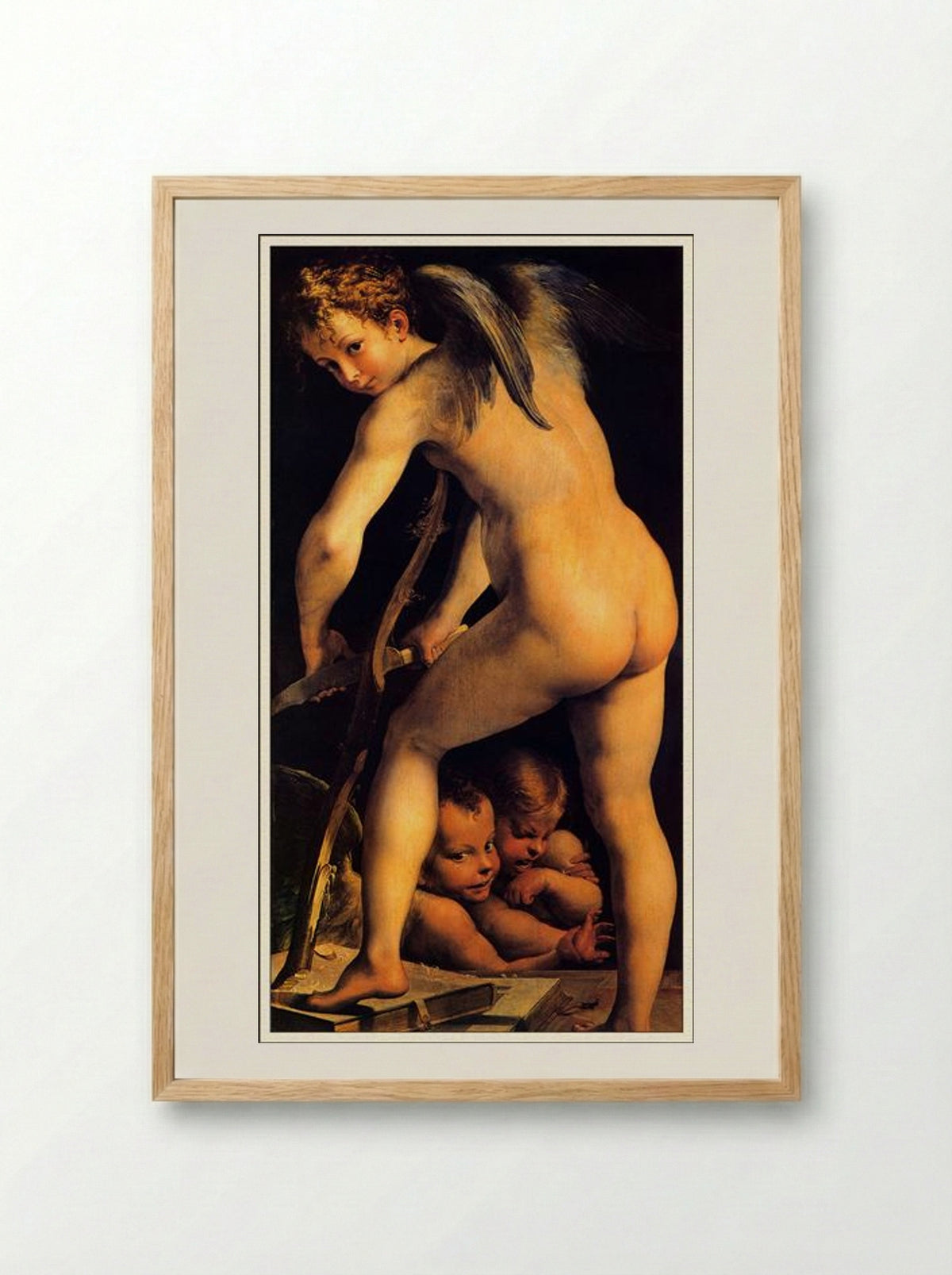Amor Carving His Bow - Parmigianino - Framed Print Wood
