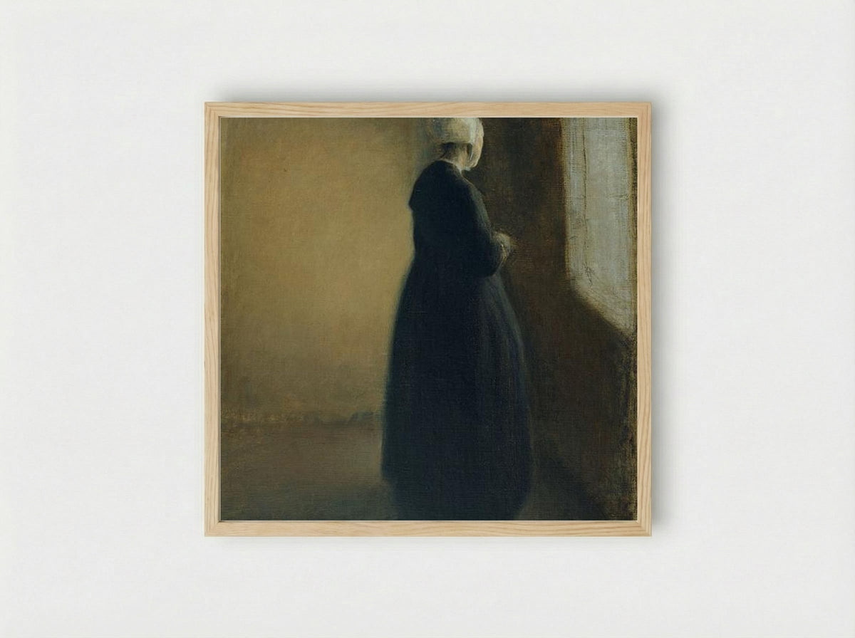 An Old Woman Standing by a Window - Vilhelm Hammershøi - Framed Print Wood