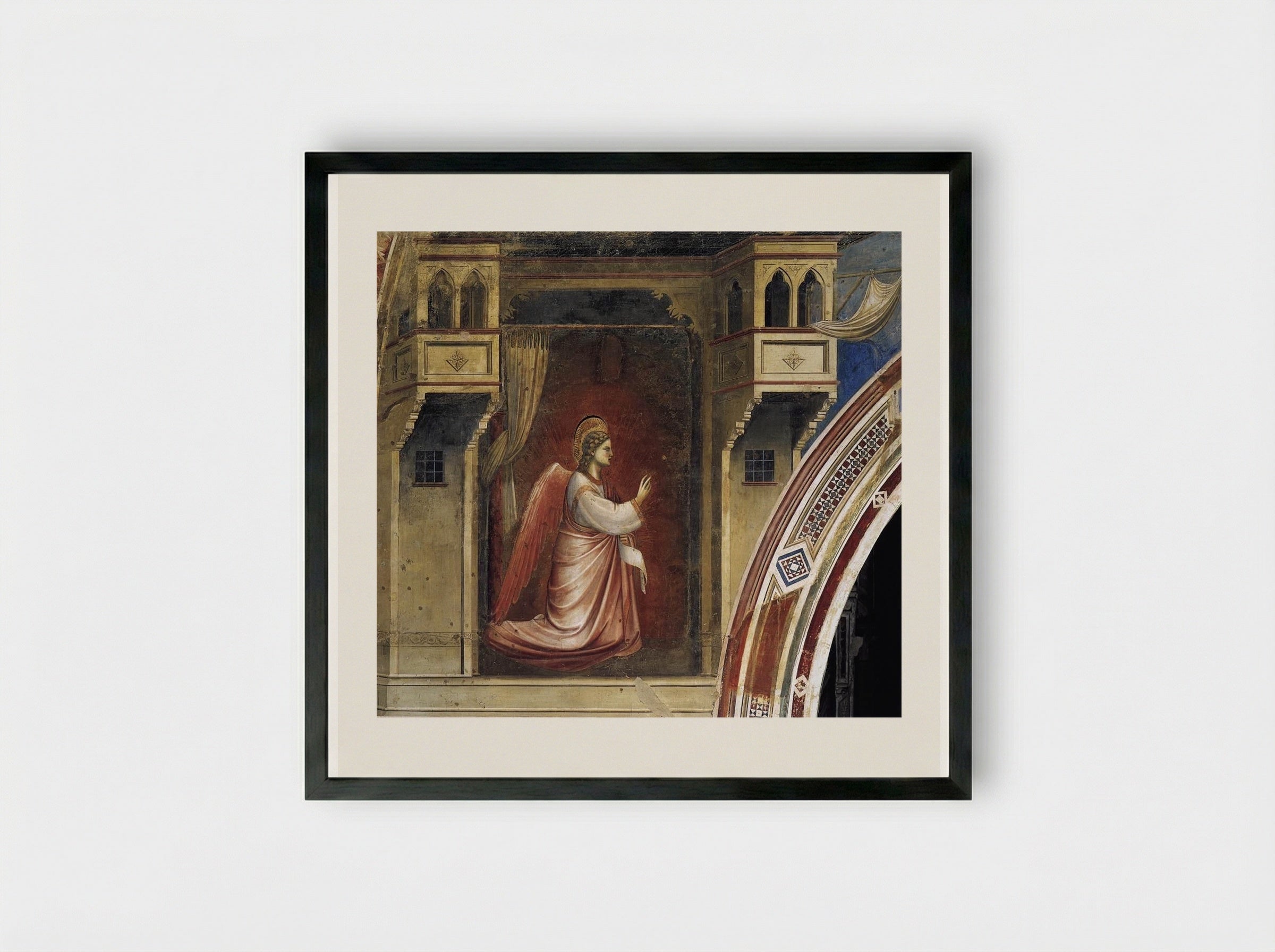 Annunciation: The Angel Gabriel - Giotto di Bondone - Framed Print Black