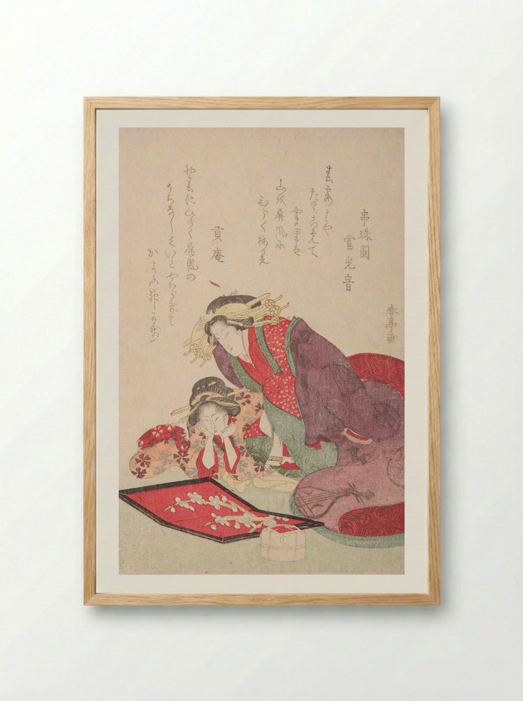Courtesan and Kamuro Looking at a Screen - Katsukawa Shuntei - Framed Print Wood