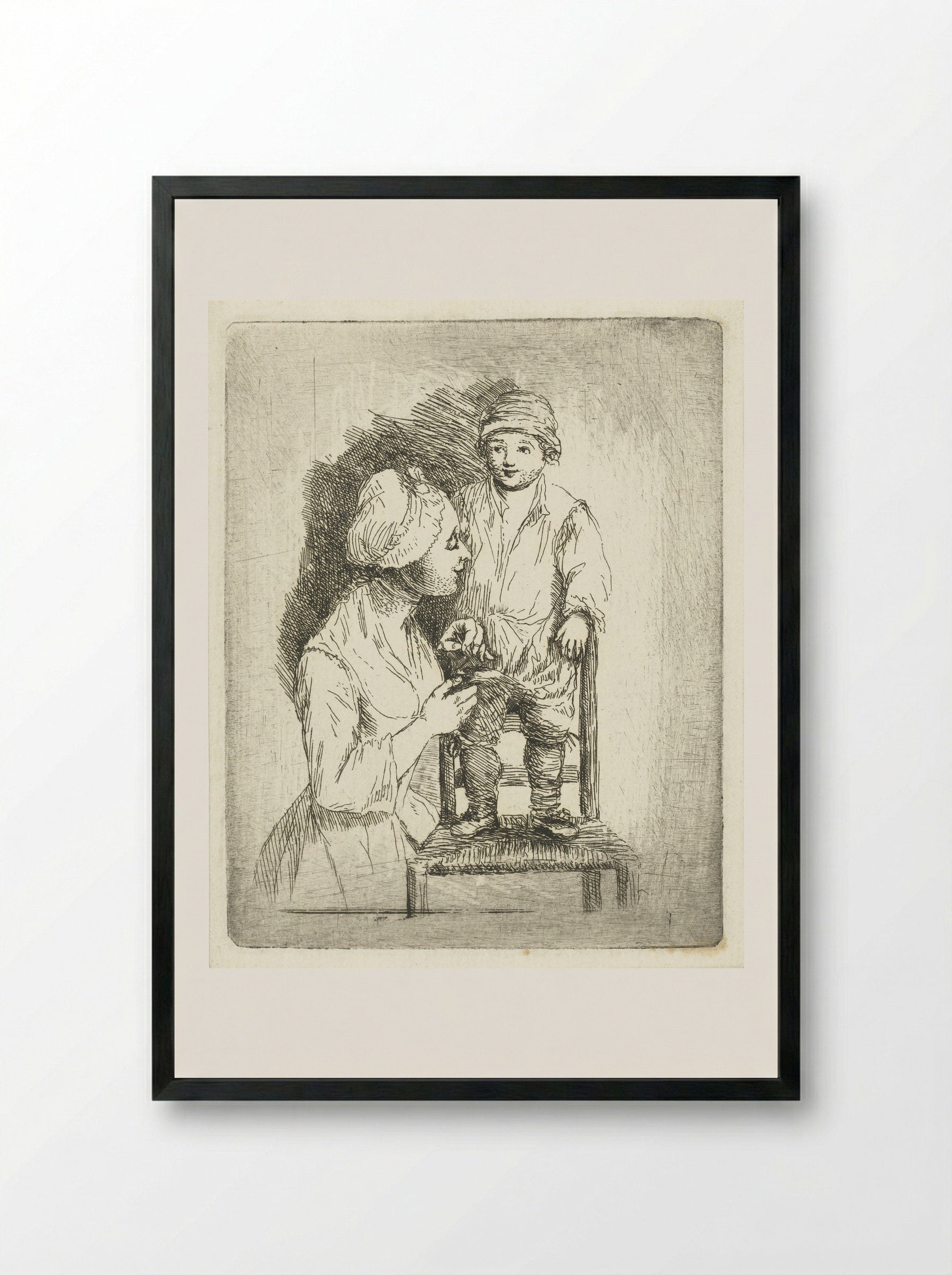 Een moeder zet een knoop aan de broek van haar zoon - Louis Bernard Coclers - Framed Print Black