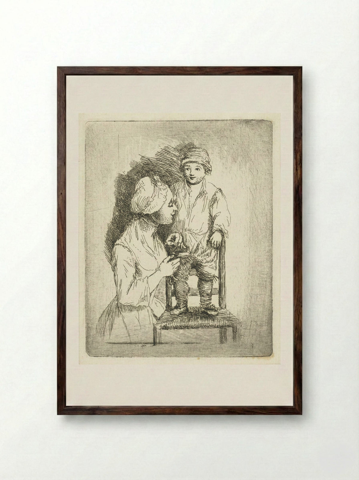 Een moeder zet een knoop aan de broek van haar zoon - Louis Bernard Coclers - Framed Print Dark Wood