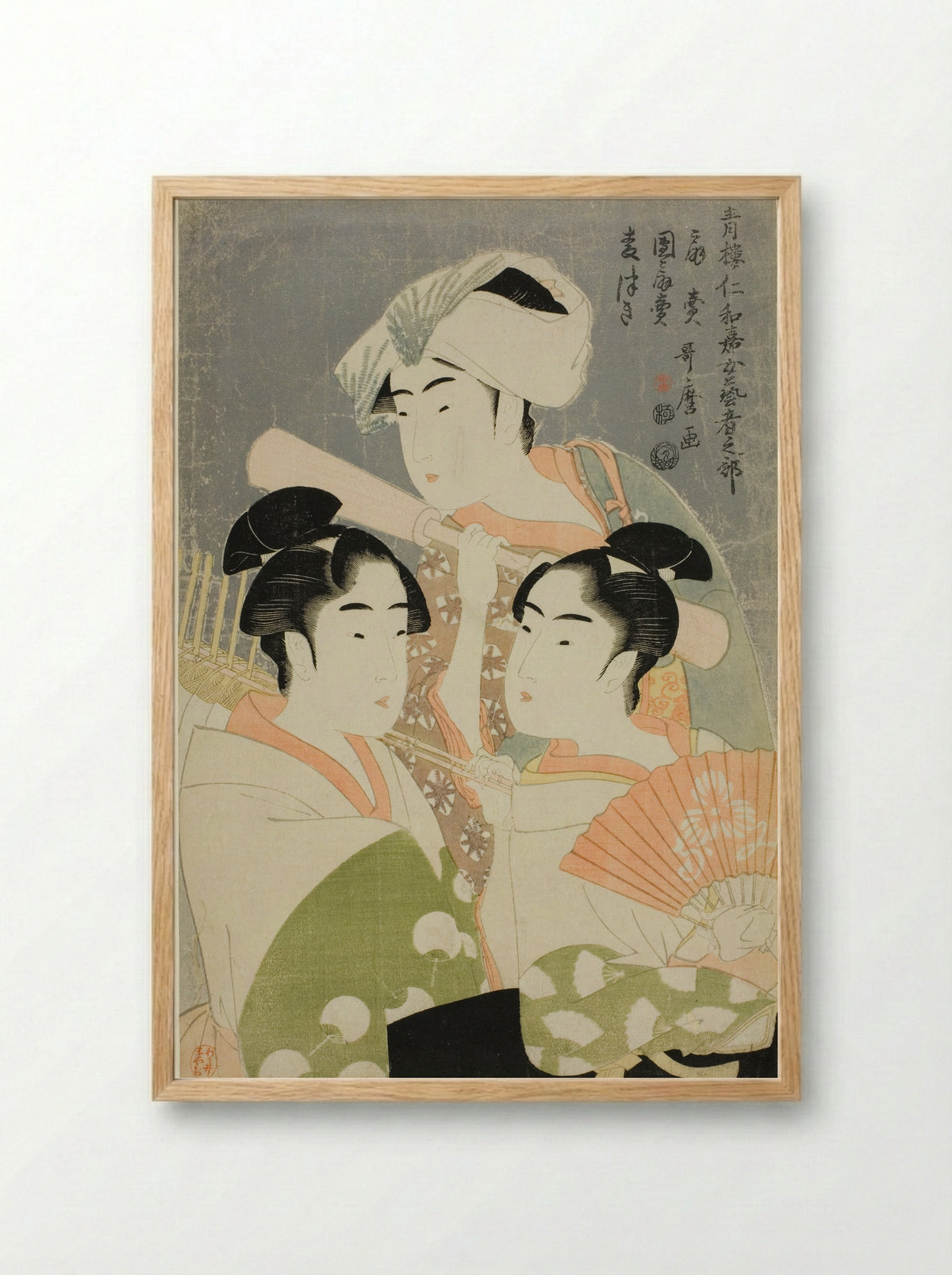 Folding Fan Seller, Round Fan Seller, and Barley Pounder - Kitagawa Utamaro - Framed Print Wood