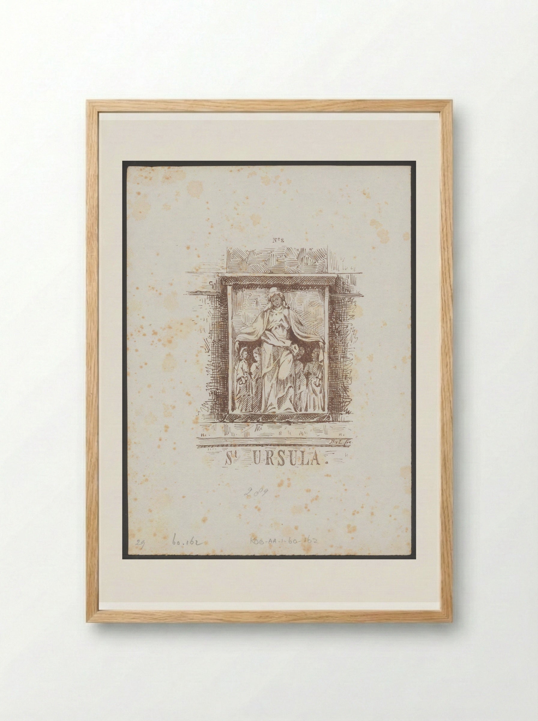 Gevelsteen met de heilige Ursula in het Begijnhof in Amsterdam - Jac van Looij - Framed Print Wood