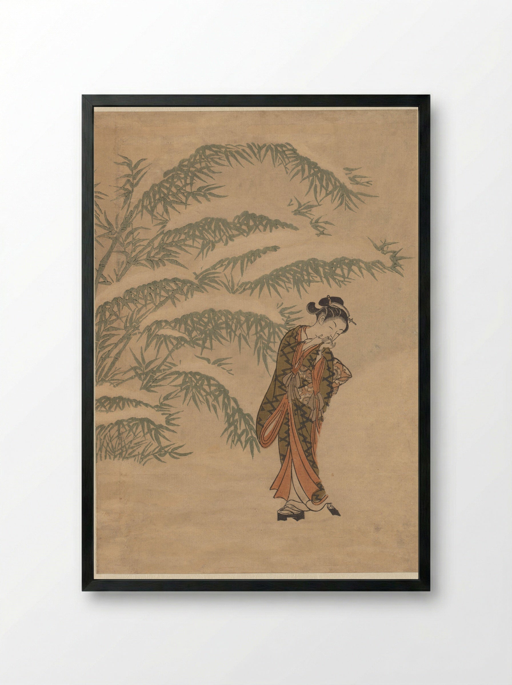 Girl Warming Her Hands with a Snowball - Suzuki Harunobu - Framed Print Black