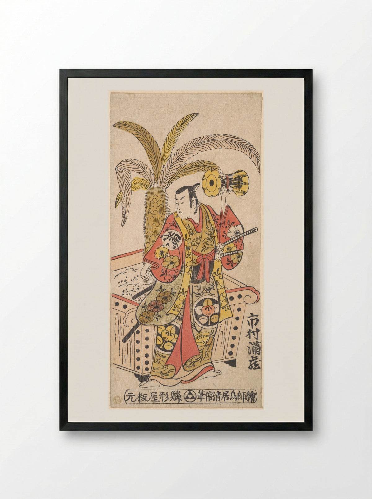 Ichimura Manzō as a Samurai Holding a Hand Drum (Kotsuzumi) - Torii Kiyomasu II - Framed Print Black