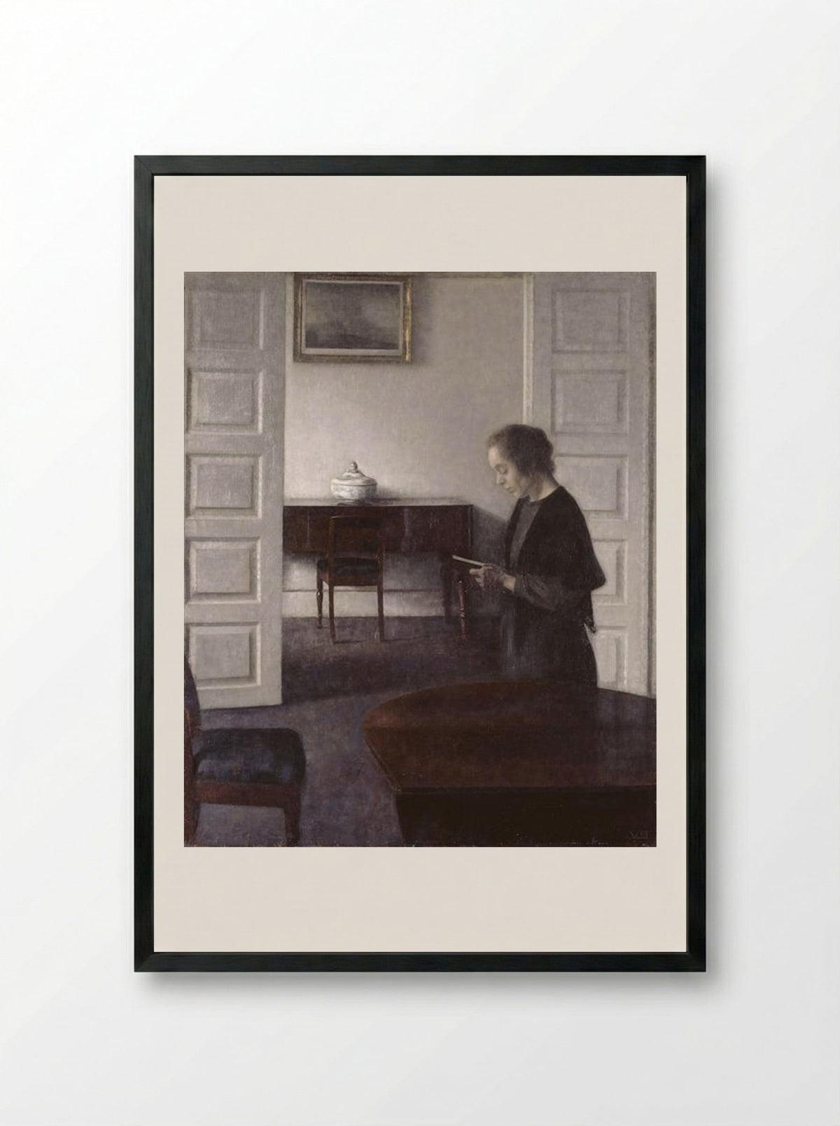 Interior with a Reading Lady - Vilhelm Hammershøi - Framed Print Black