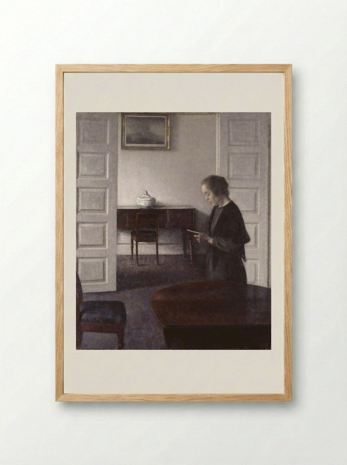 Interior with a Reading Lady - Vilhelm Hammershøi - Framed Print Wood
