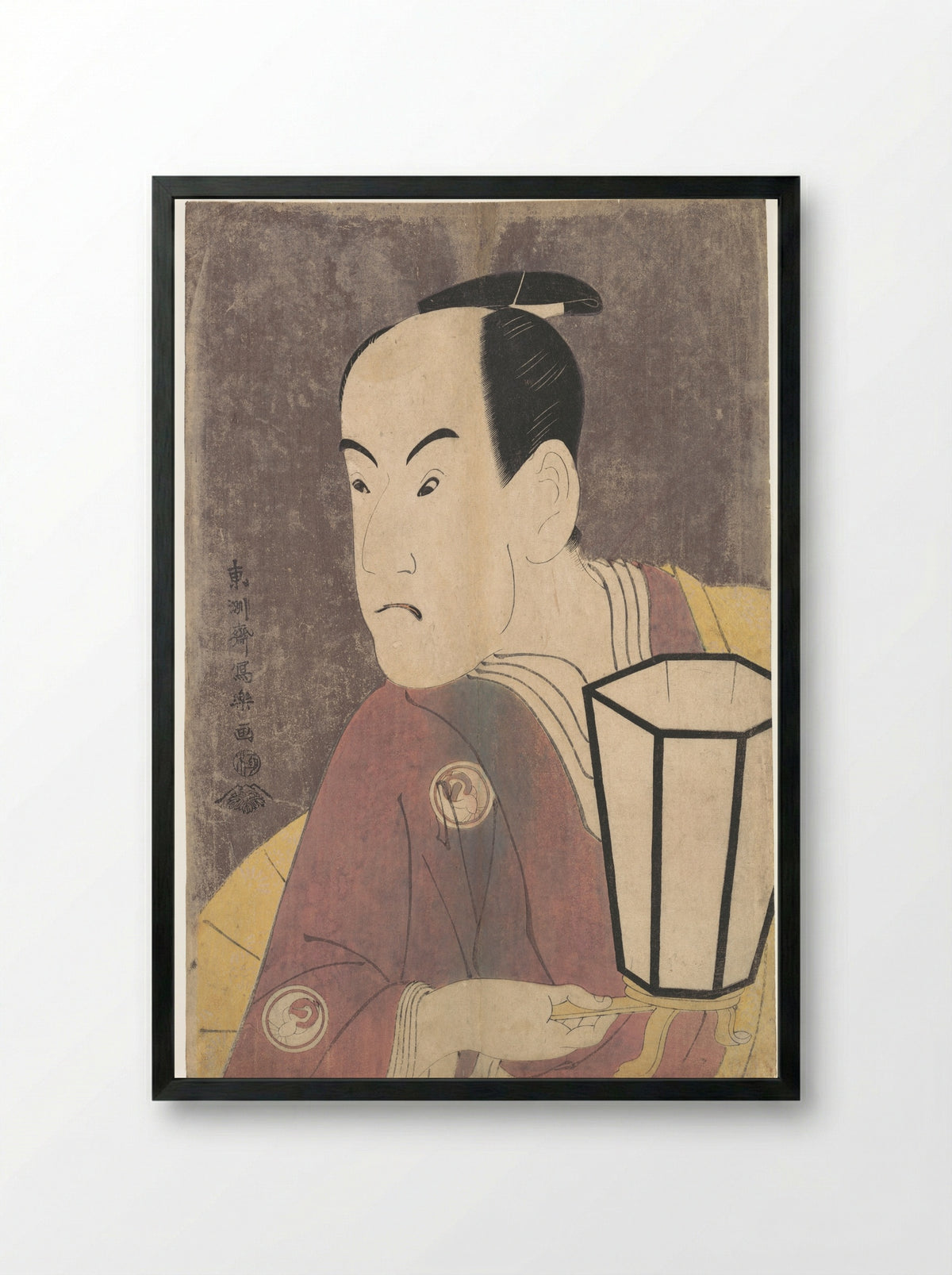 Kinokuniya Tosshi (The actor Sawamura Sojuro III as Kujaku Saburo Narihira) - Tōshūsai Sharaku - Framed Print Black