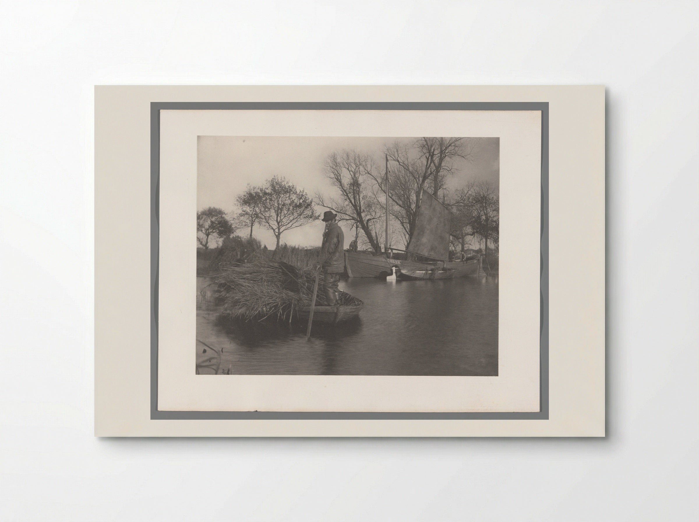 Man on a Boat with Reeds - Peter Henry Emerson - Poster