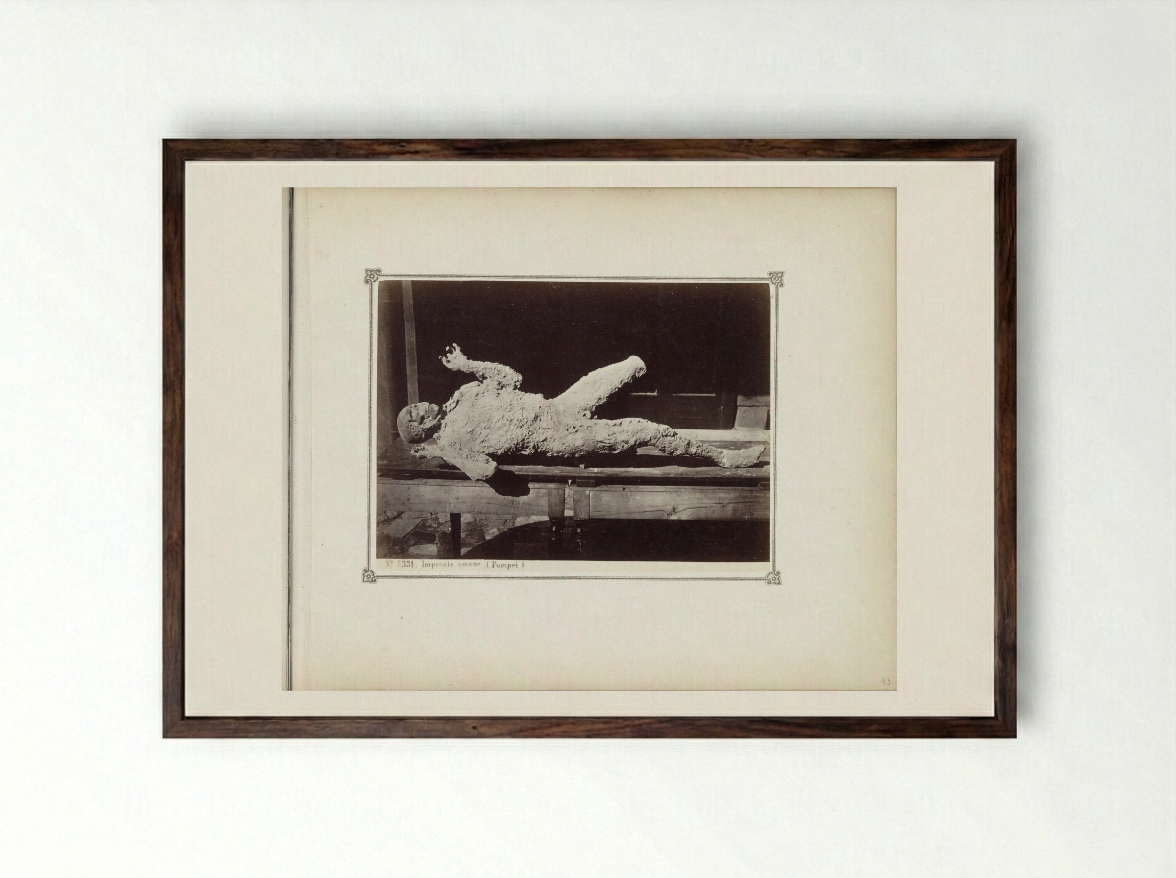 Plaster Cast of a Victim of the Eruption of Vesuvius - Giorgio Sommer - Framed Print Dark Wood