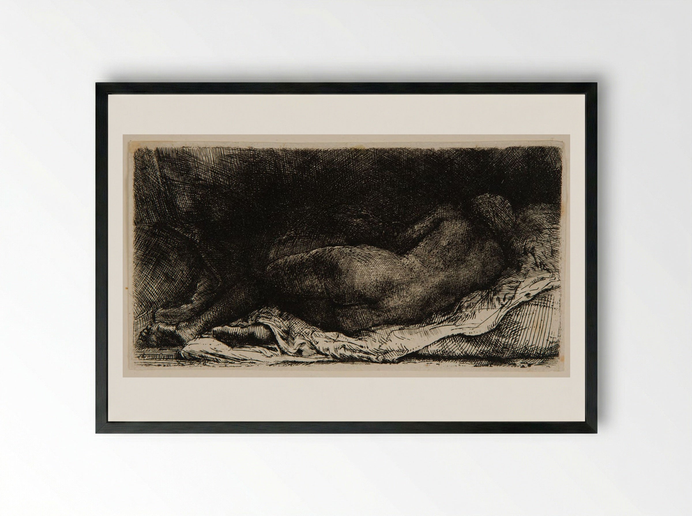 Reclining Female Nude - Rembrandt Harmensz. van Rijn - Framed Print Black