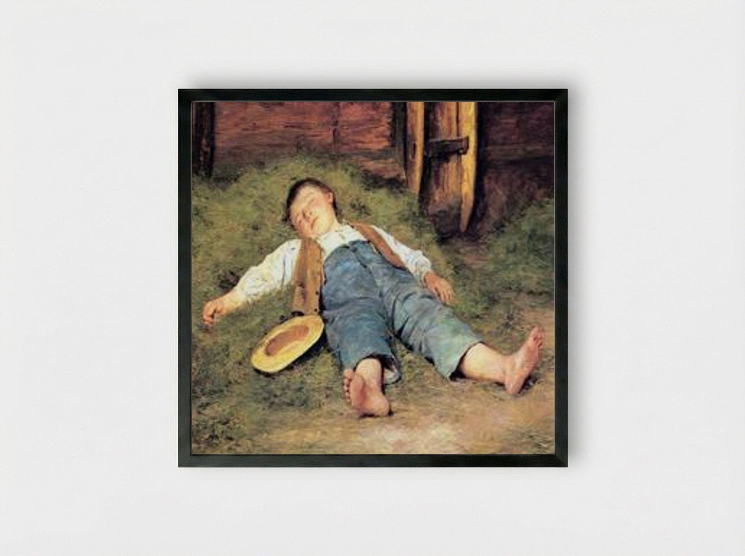 Schlafender Knabe im Heu - Albert Anker - Framed Print Black