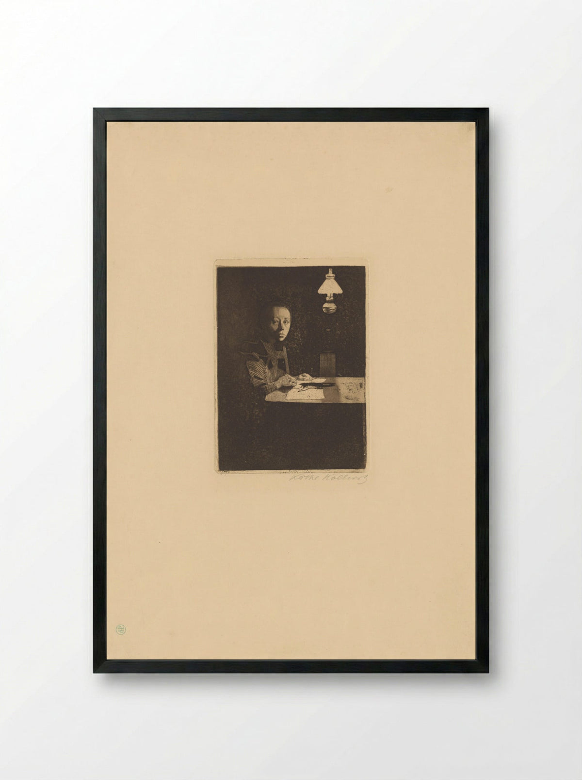 Self-Portrait at the Table - Käthe Kollwitz - Framed Print Black