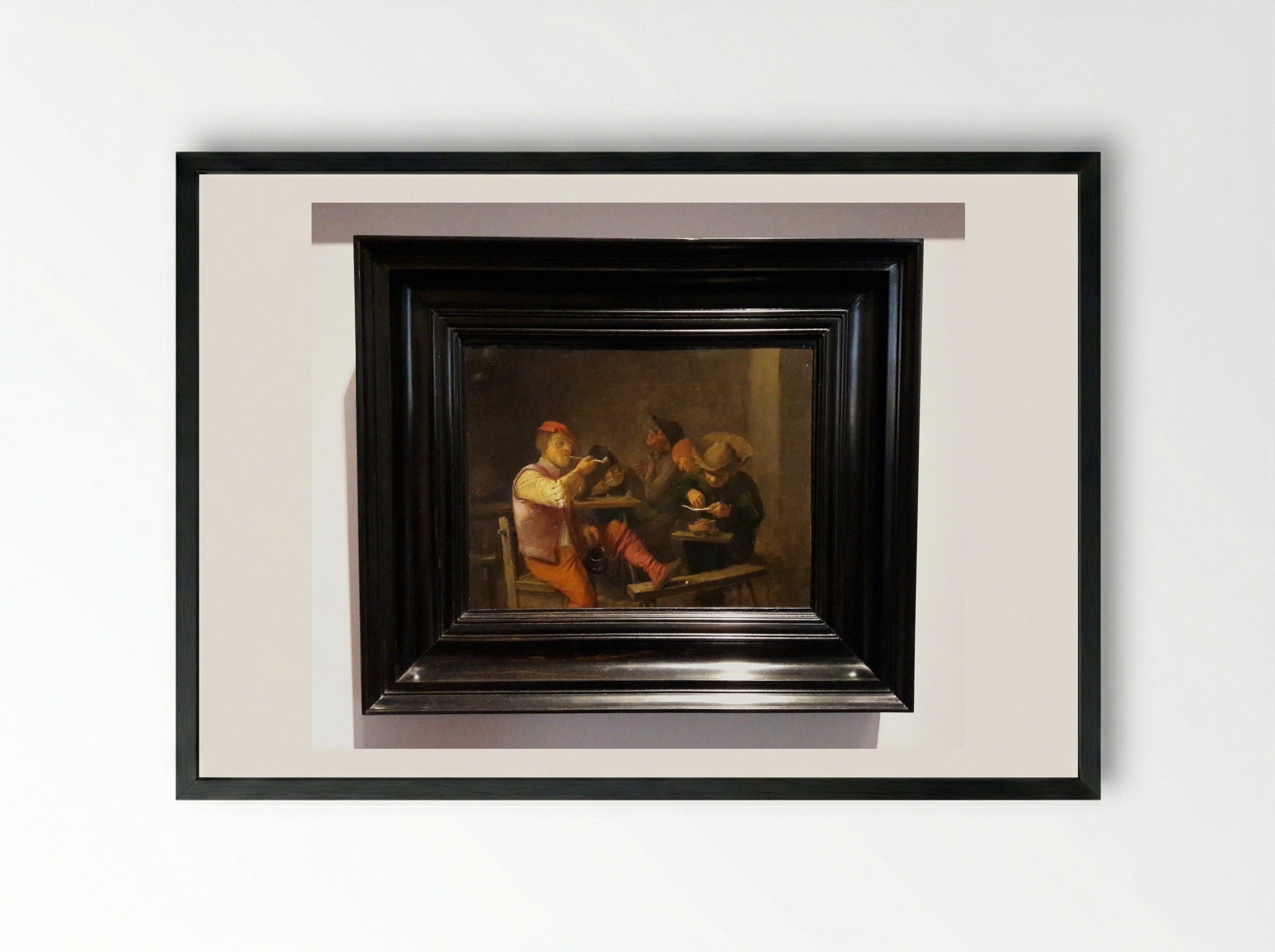 Smokers in an Inn - Adriaen Brouwer - Framed Print Black