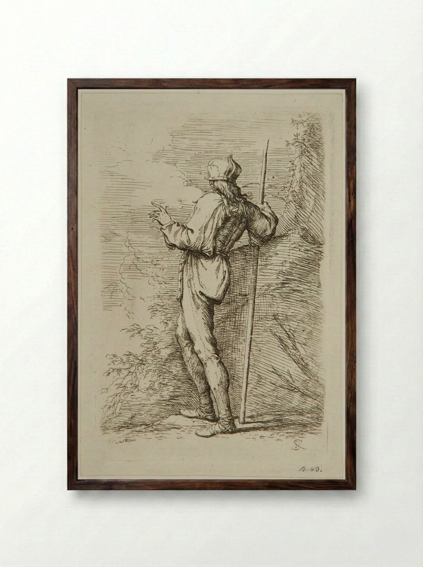 Soldier with a Staff Standing Next to a Large Rock - Salvator Rosa - Framed Print Dark Wood