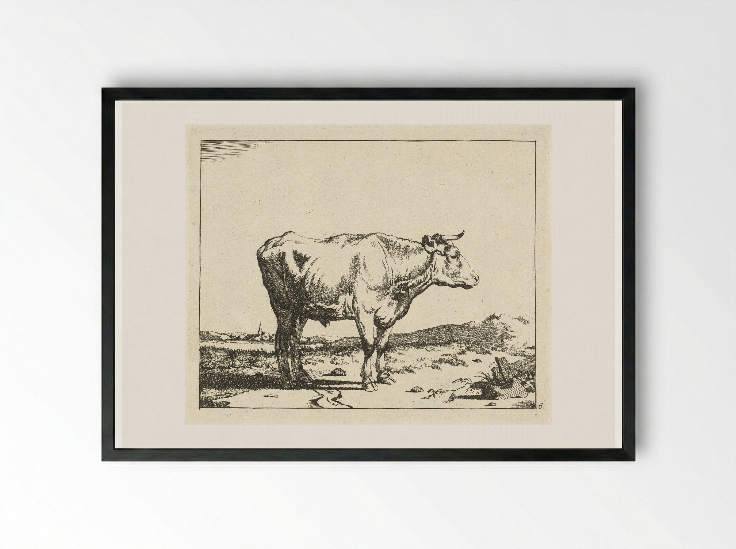 Stier, naar rechts, met kerktoren op achtergrond - Marcus de Bye - Framed Print Black