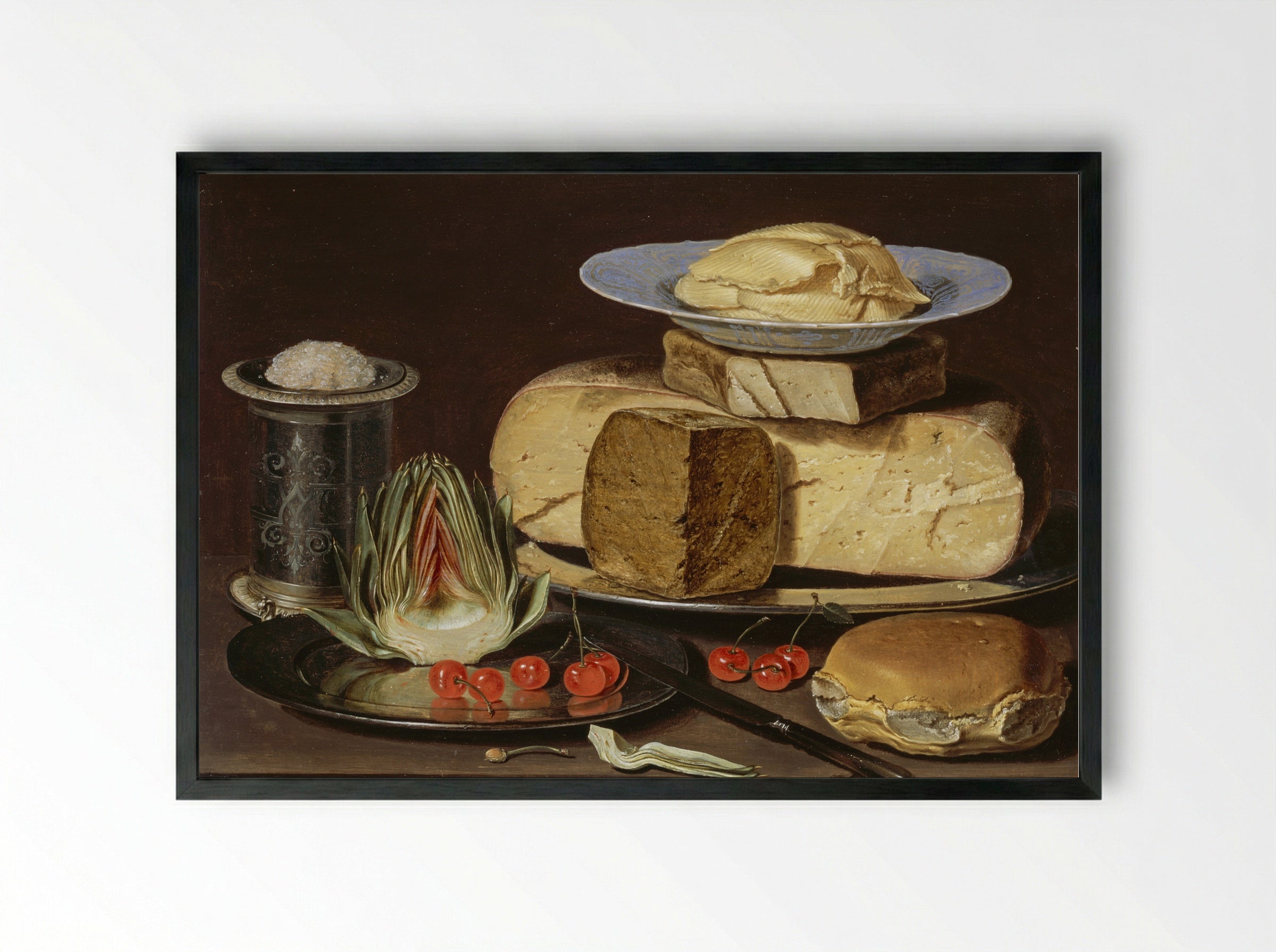 Still Life with Cheeses, Artichoke, and Cherries - Clara Peeters - Framed Print Black