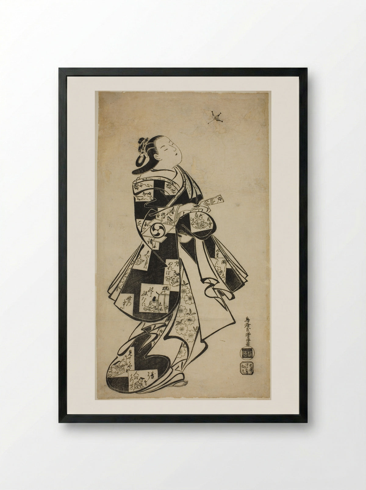 The Actor Nakamura Gentaro as a woman playing battledore and shuttlecock - Torii Kiyomasu I - Framed Print Black