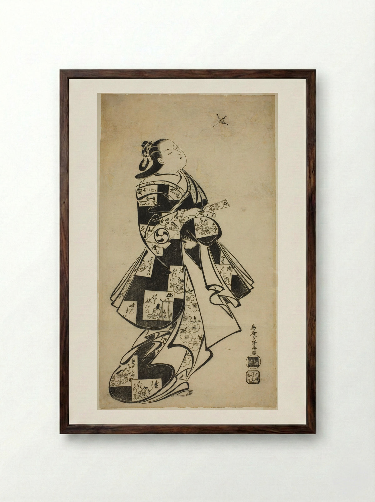 The Actor Nakamura Gentaro as a woman playing battledore and shuttlecock - Torii Kiyomasu I - Framed Print Dark Wood