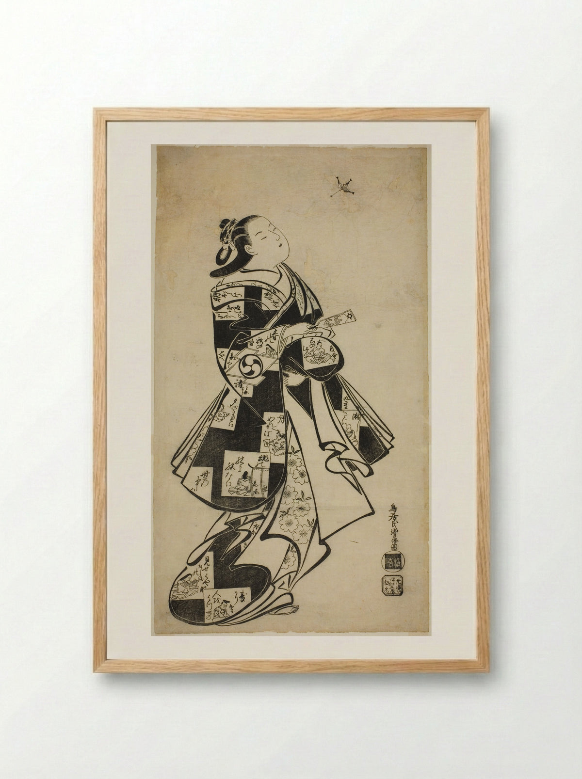 The Actor Nakamura Gentaro as a woman playing battledore and shuttlecock - Torii Kiyomasu I - Framed Print Wood