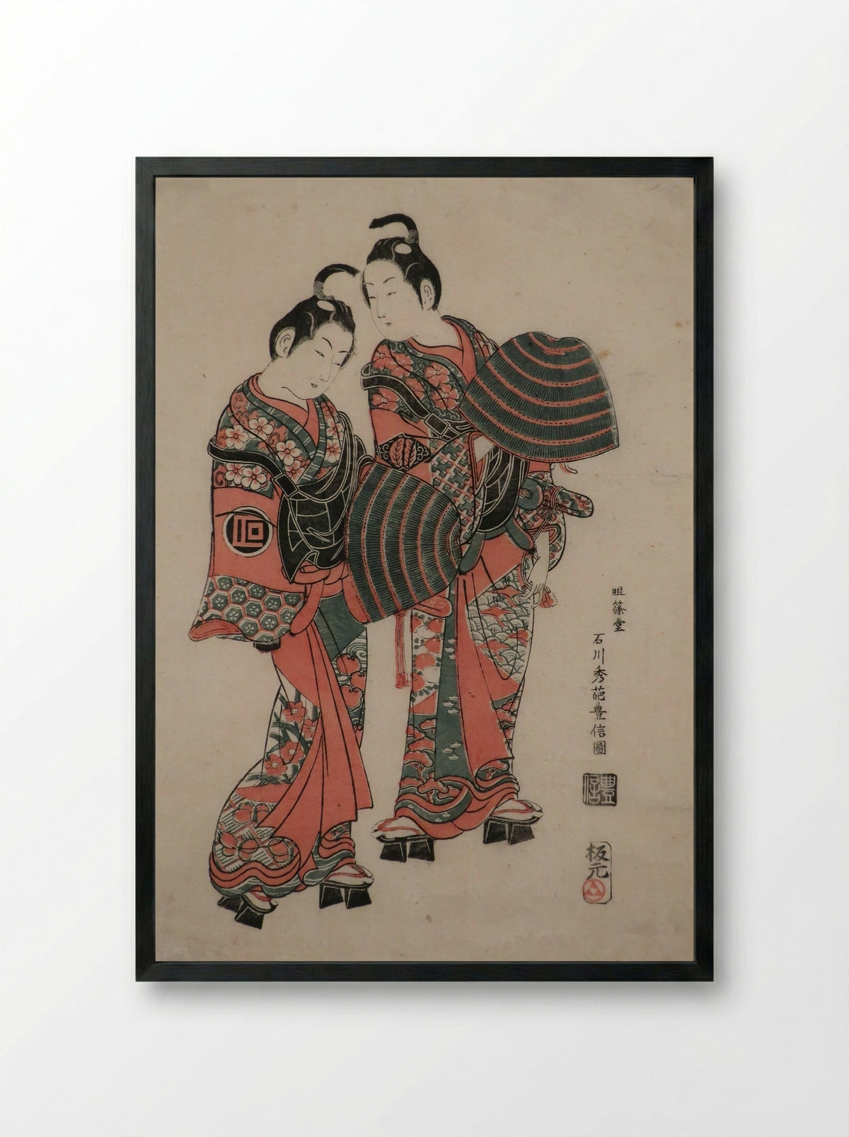 The Actors Sanogawa Ichimatsu I and Segawa Kikunojo I as lovers under an umbrella - Ishikawa Toyonobu - Framed Print Black