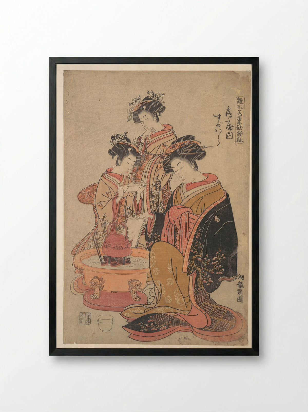 The Oiran Sugawara of Tsuru-ya seated beside a hibachi - Isoda Koryūsai - Framed Print Black