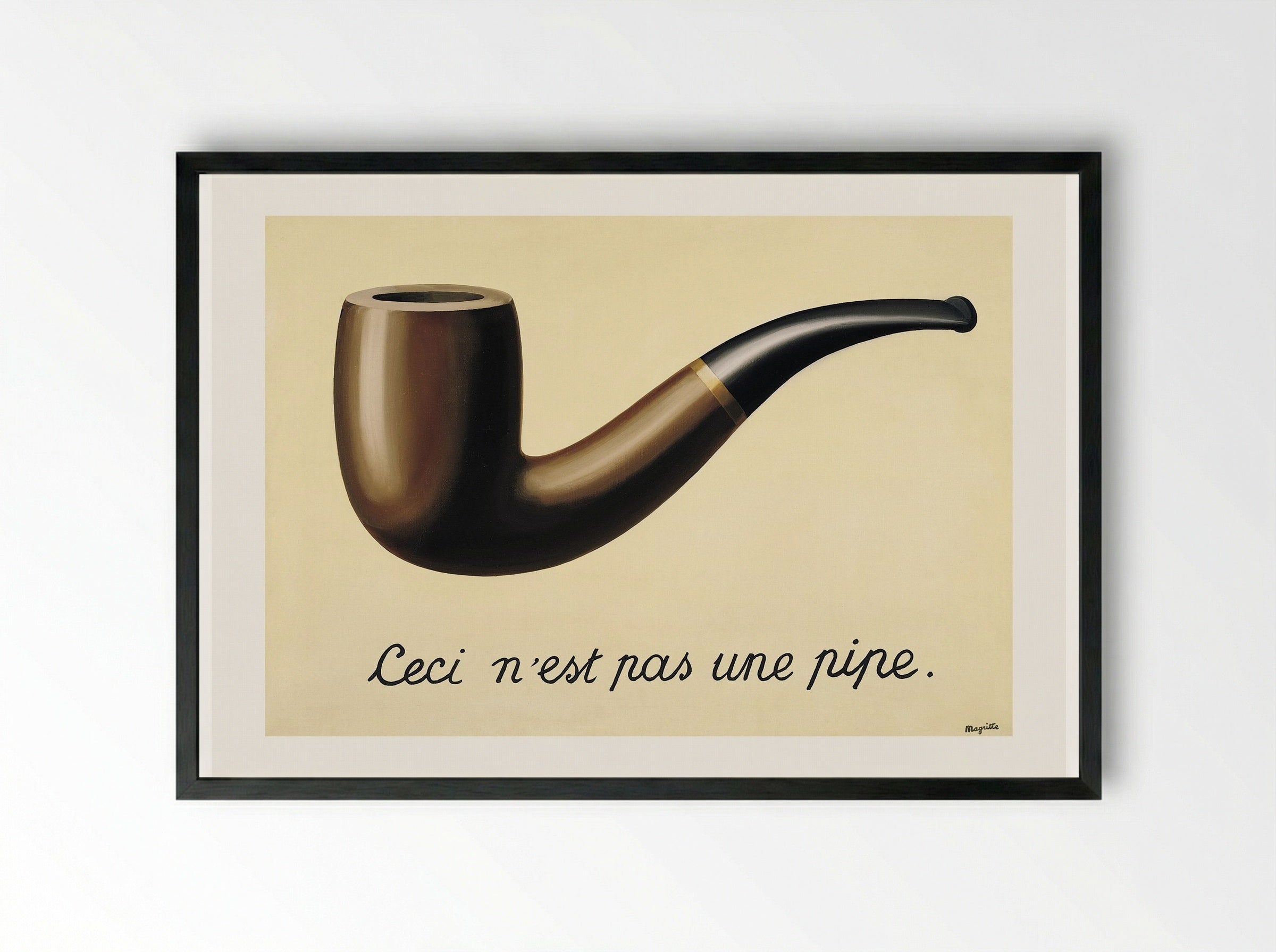 The Treachery of Images (This is Not a Pipe) - René Magritte - Framed Print Black