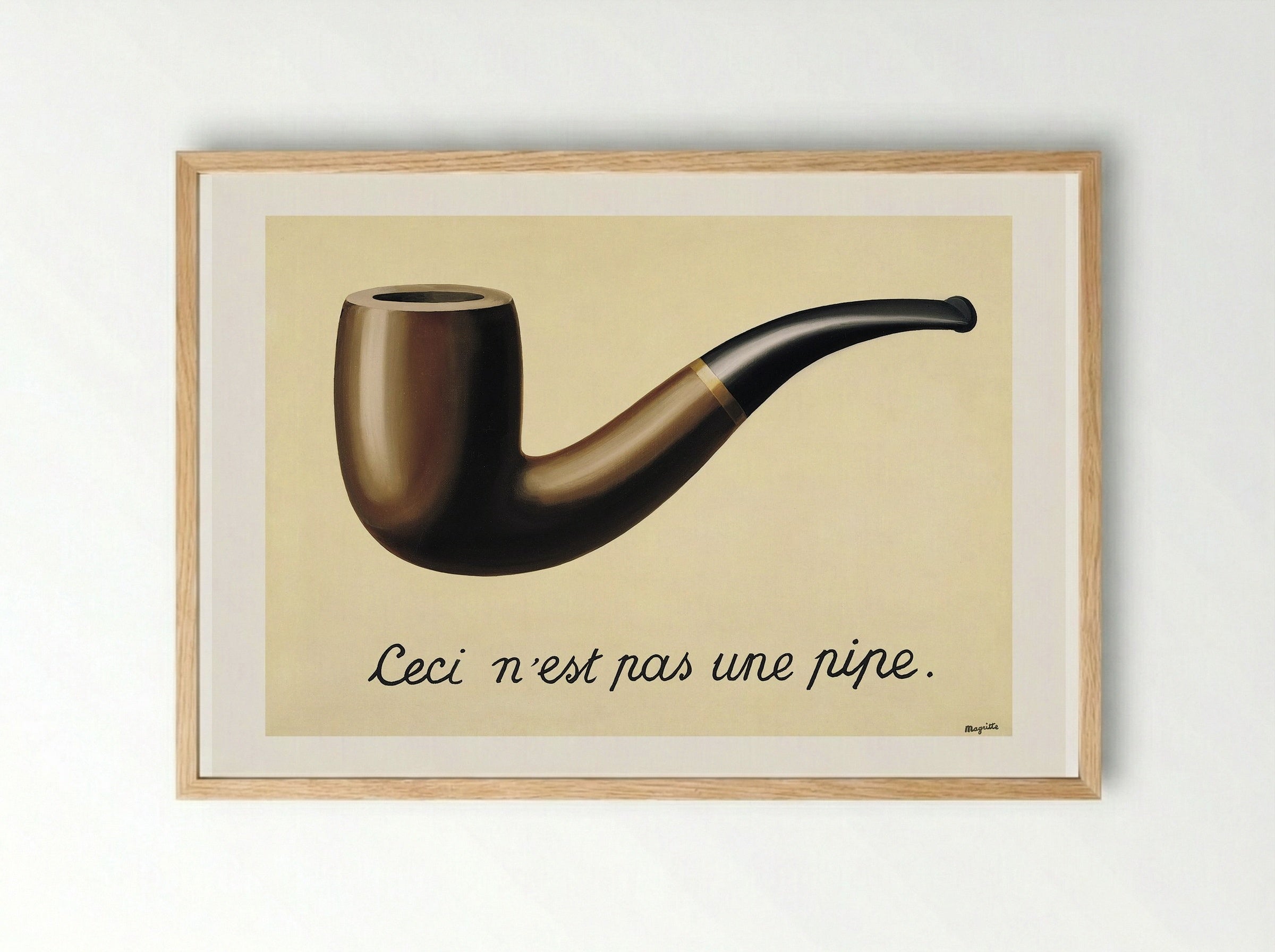 The Treachery of Images (This is Not a Pipe) - René Magritte - Framed Print Wood