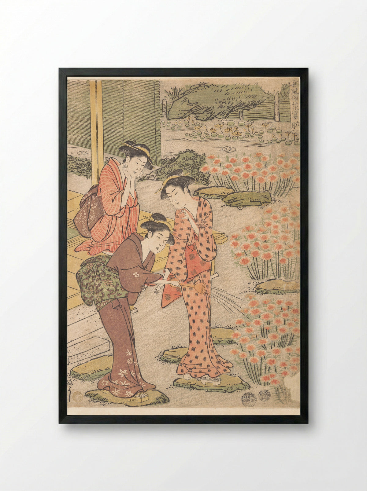 Three Young Women in a Garden where Nadeshiko Pinks are Growing - Kuwagata Keisai - Framed Print Black