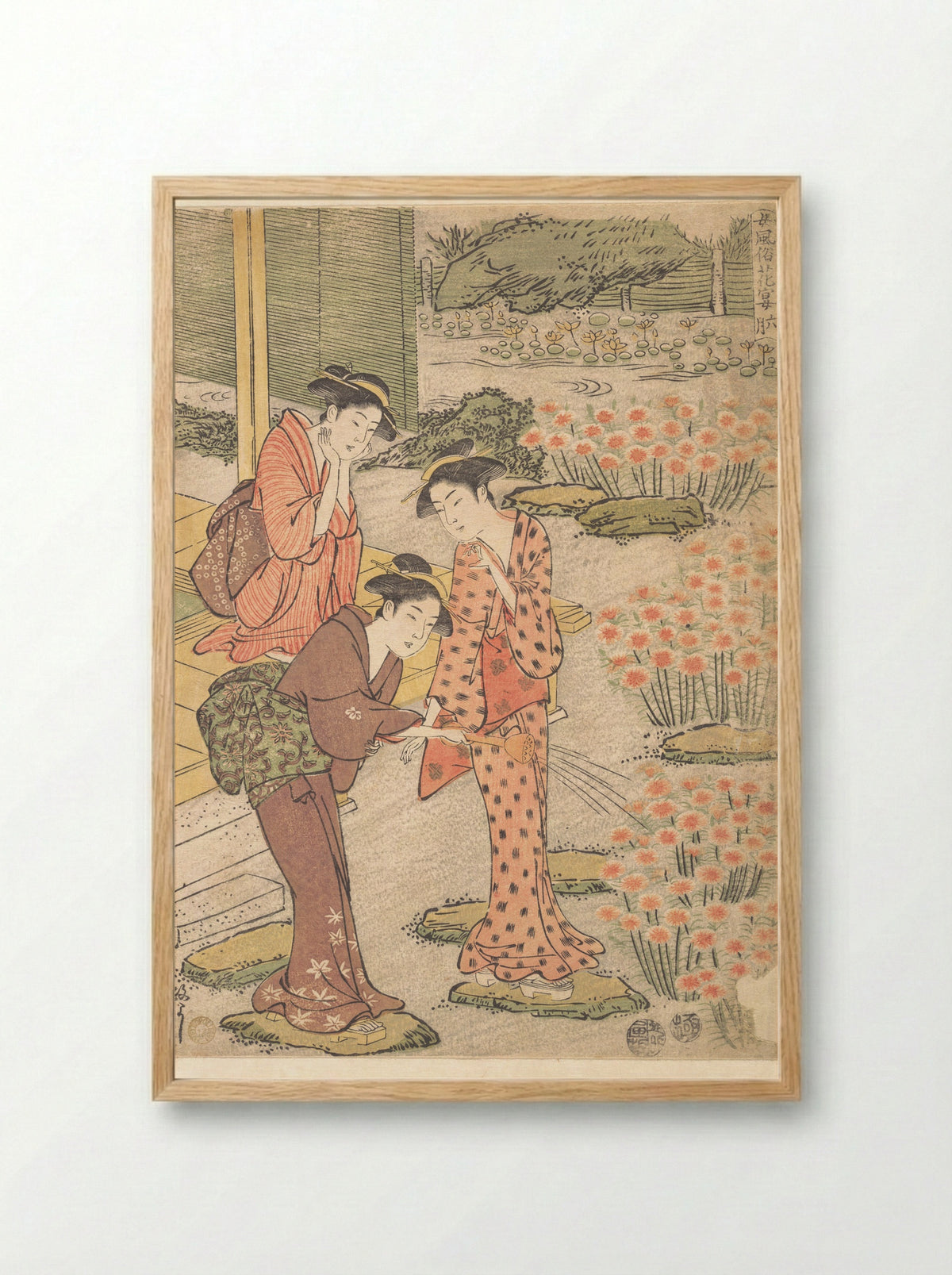 Three Young Women in a Garden where Nadeshiko Pinks are Growing - Kuwagata Keisai - Framed Print Wood