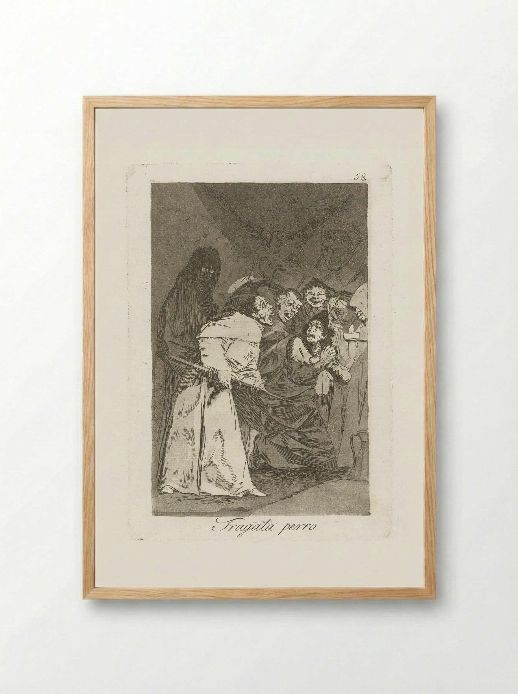 Tragala perro - Francisco de Goya - Framed Print Wood