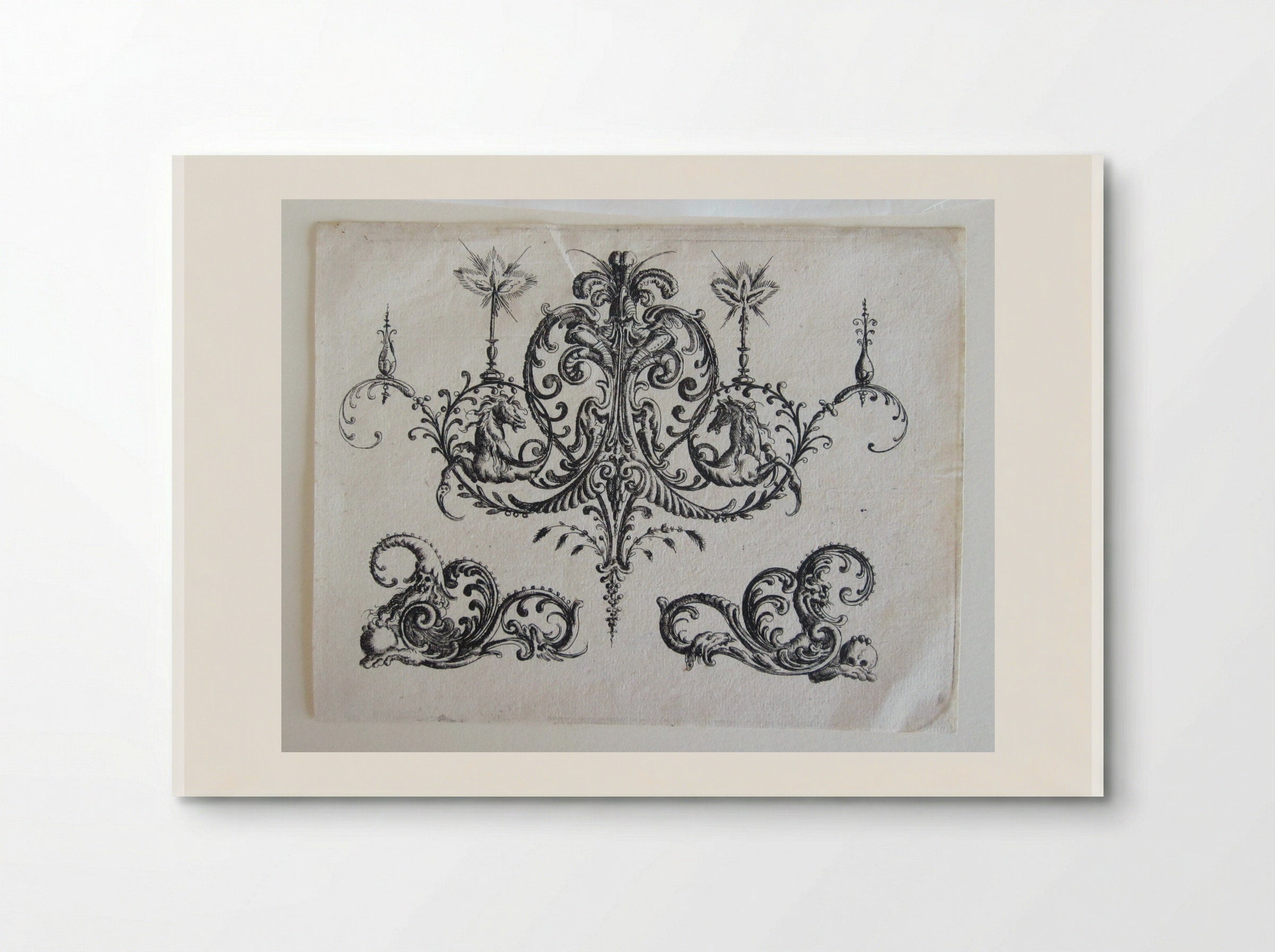 Tripartite Foliate Ornament, the Central Motif with a Helmet, Two Blazing Candles, and Tendrils Ending in Horses - Christoph Jamnitzer - Poster