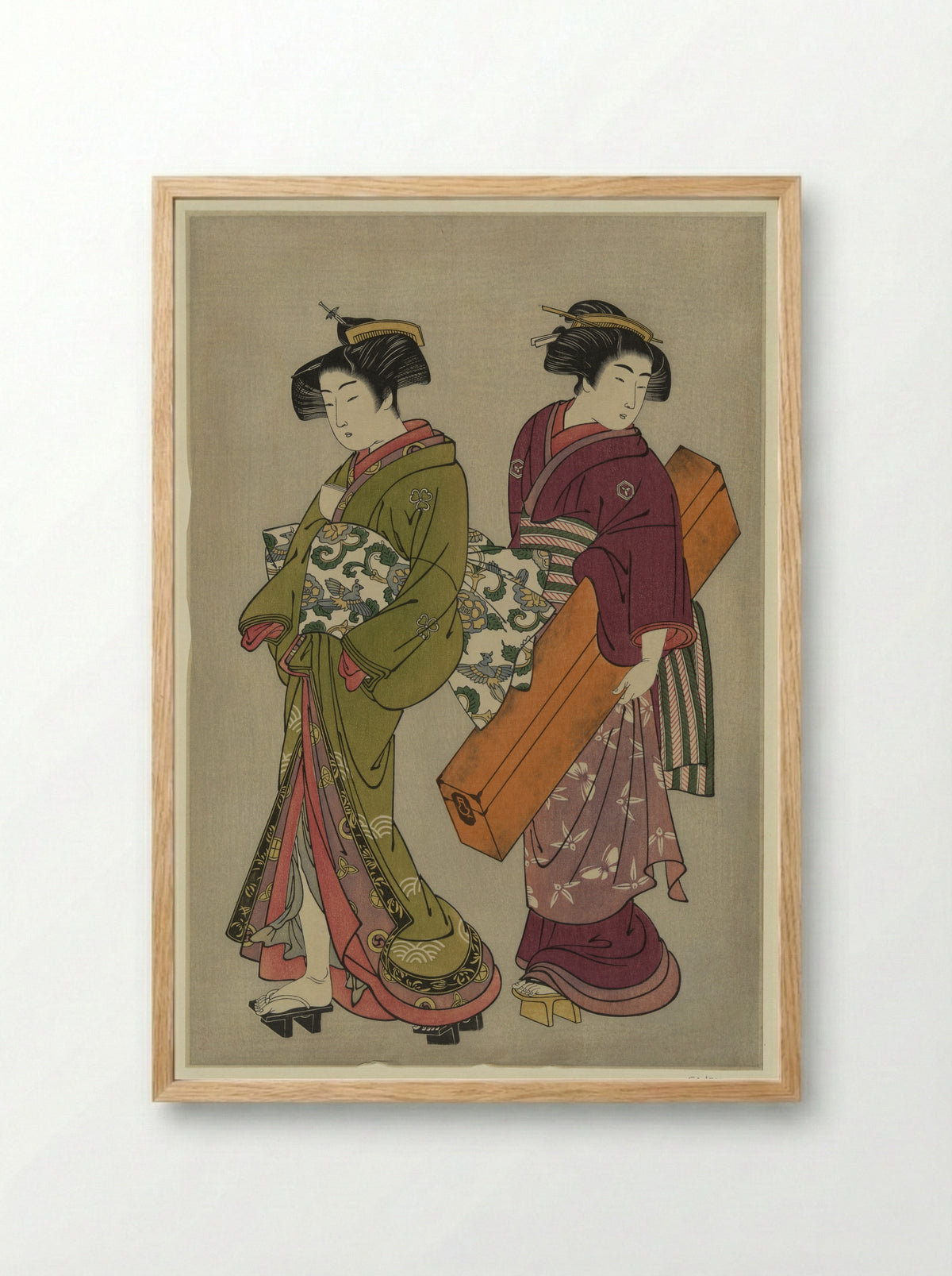 Two Geisha Holding a Shamisen and a Song Book - Kitao Shigemasa - Framed Print Wood