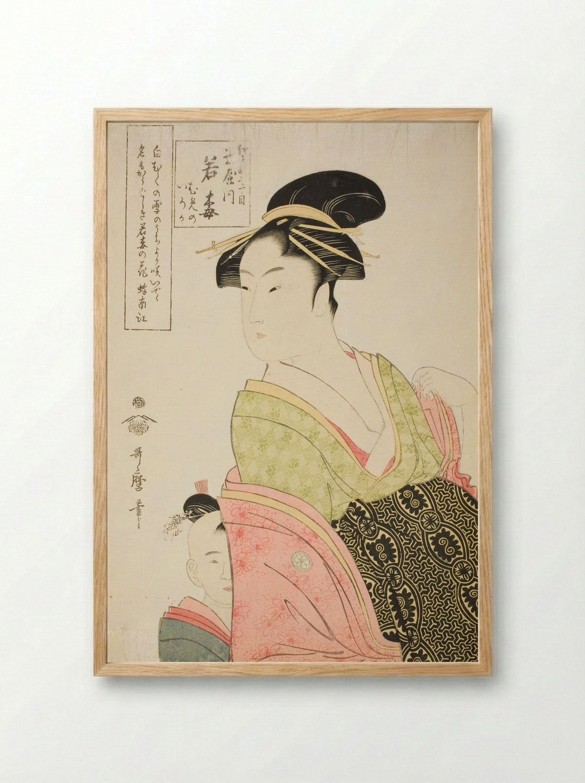 Wakaume of the Tamaya in Edo-cho itchome, and her child attendants Mumeno and Iroka - Kitagawa Utamaro - Framed Print Wood
