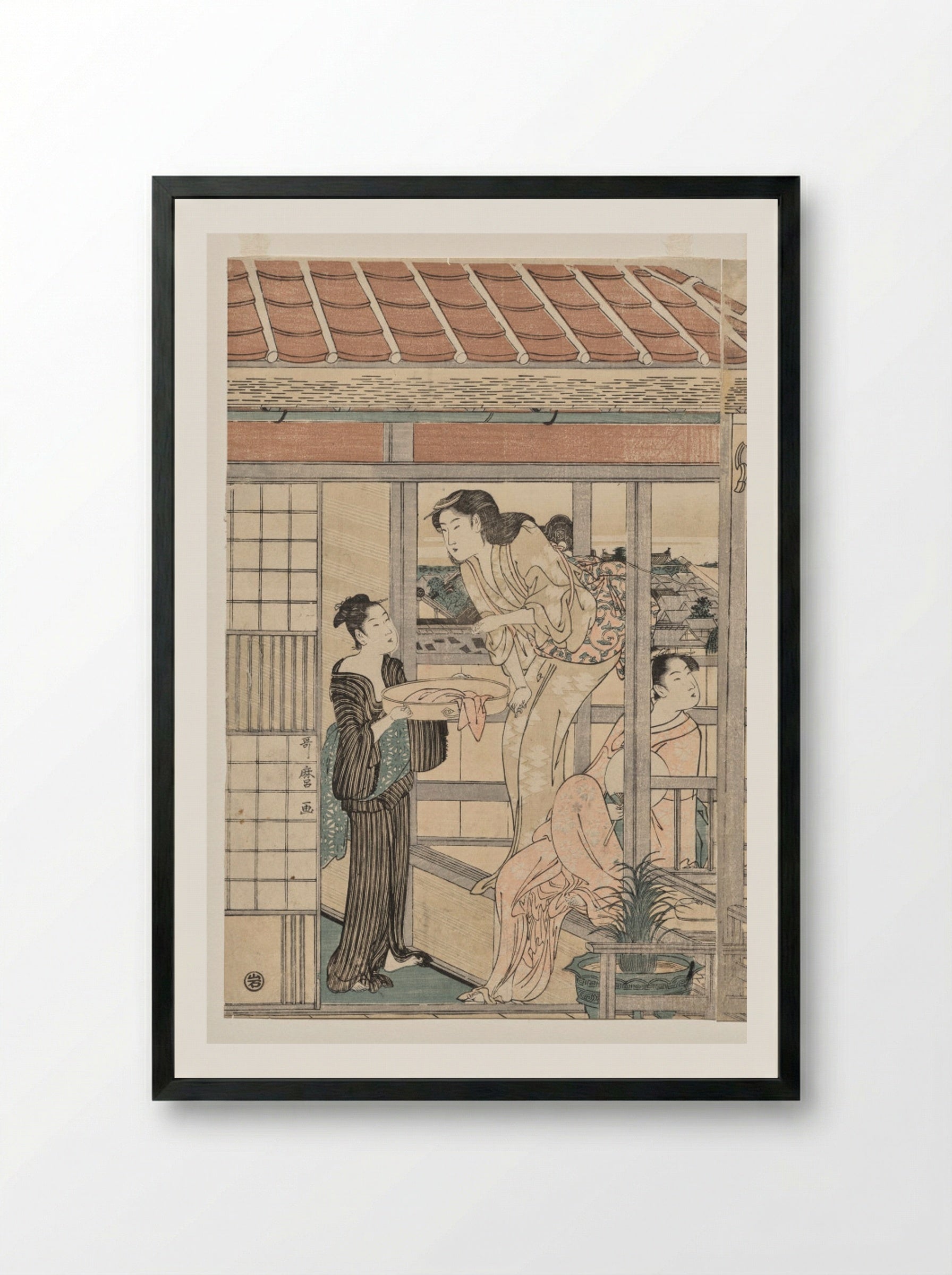Women Hanging Laundry to Dry on a Balcony - Kitagawa Utamaro - Framed Print Black