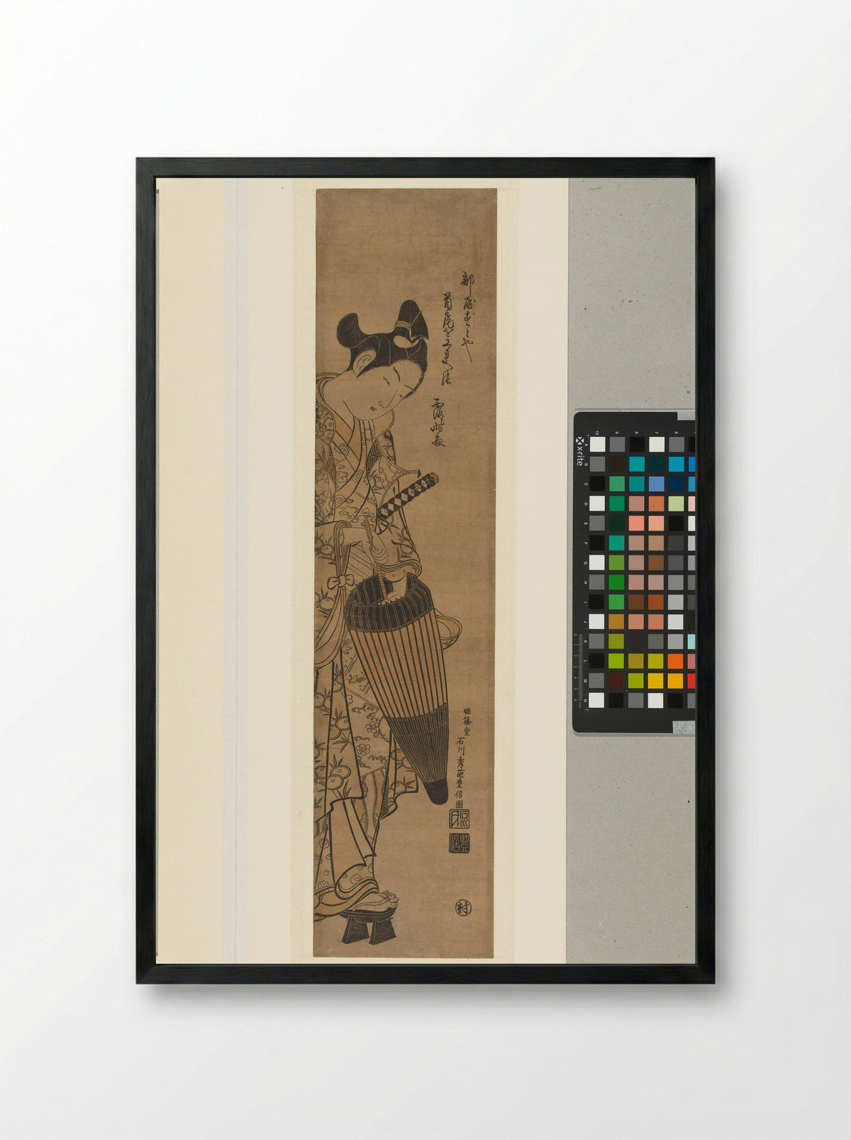 Young Man with Sword and Umbrella - Ishikawa Toyonobu - Framed Print Black