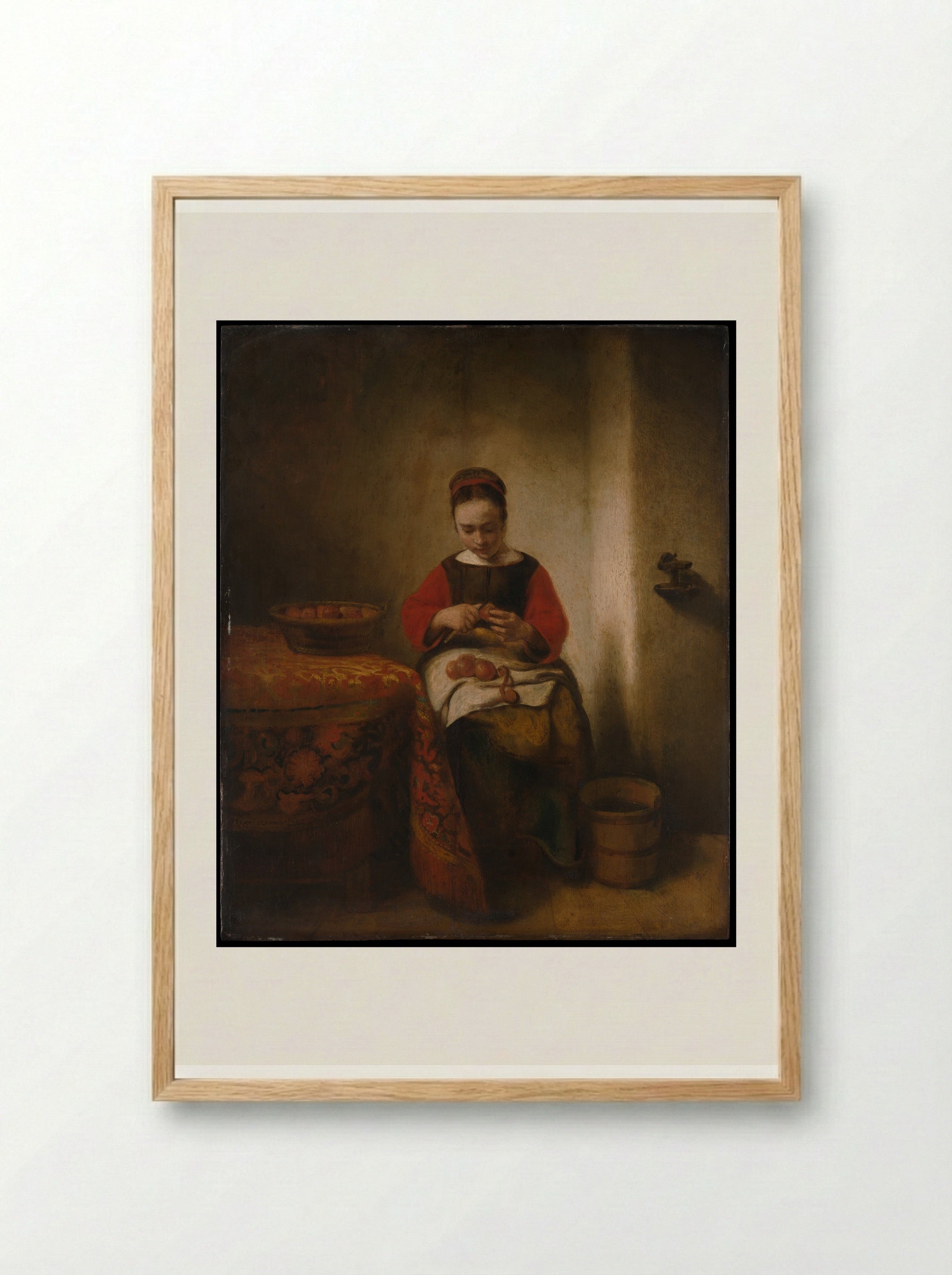 Young Woman Peeling Apples - Nicolaes Maes - Framed Print Wood